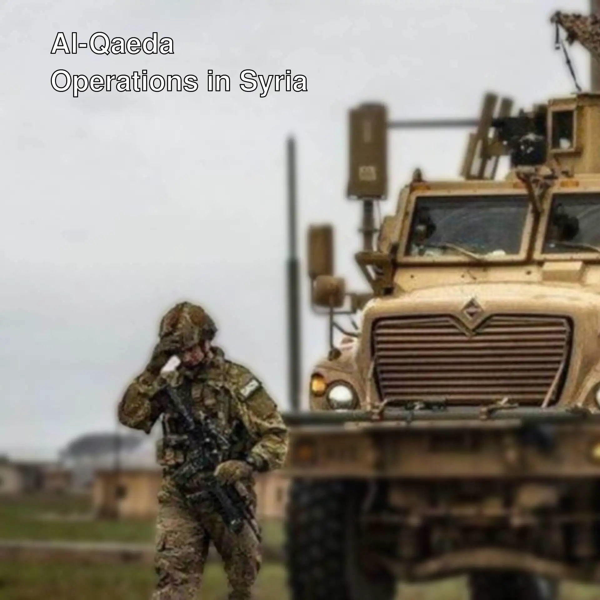 A soldier standing next to a large military vehicle.