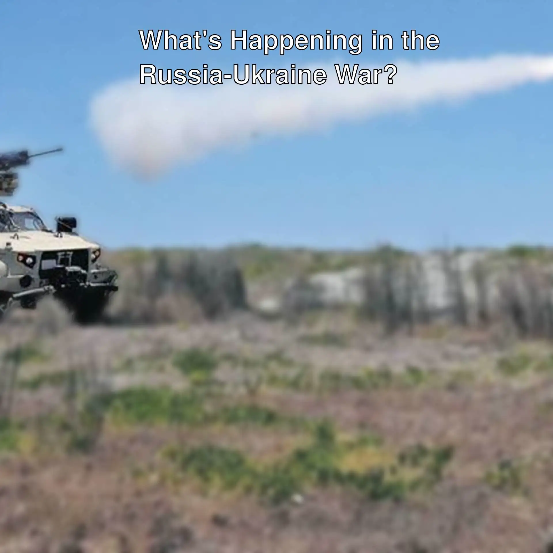 A military vehicle shooting a white smoke trail.