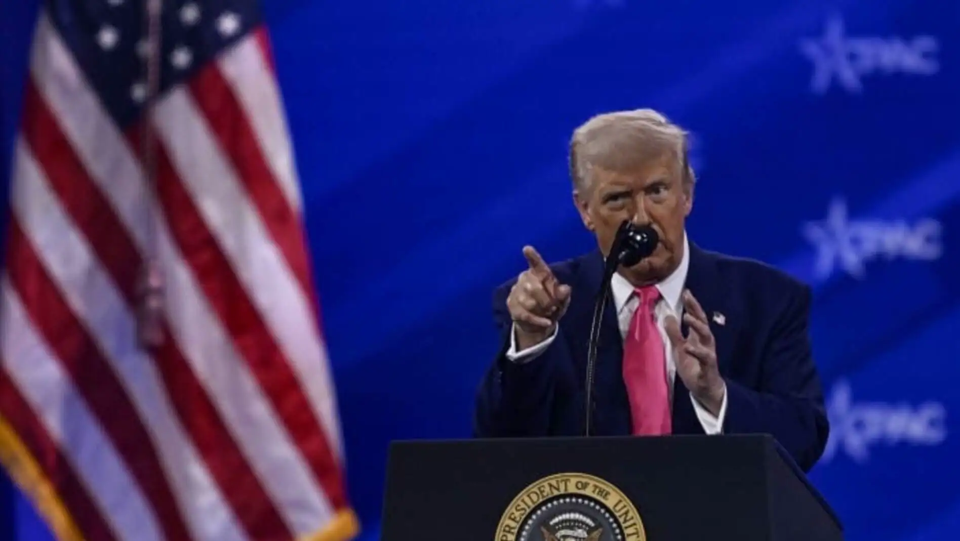 A man speaking into a microphone.
