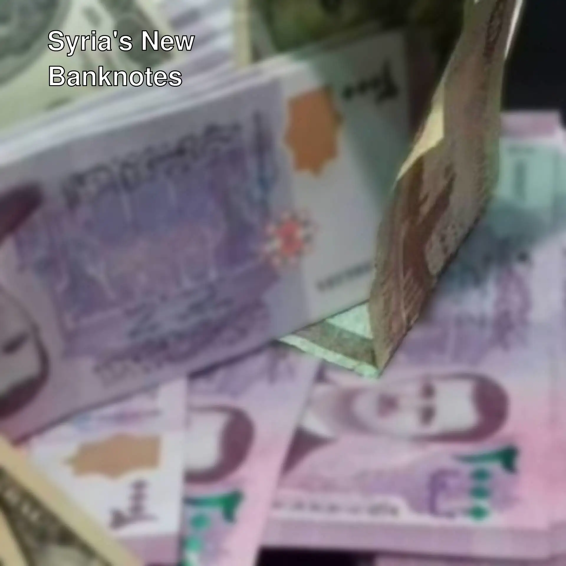 A pile of money on a table.