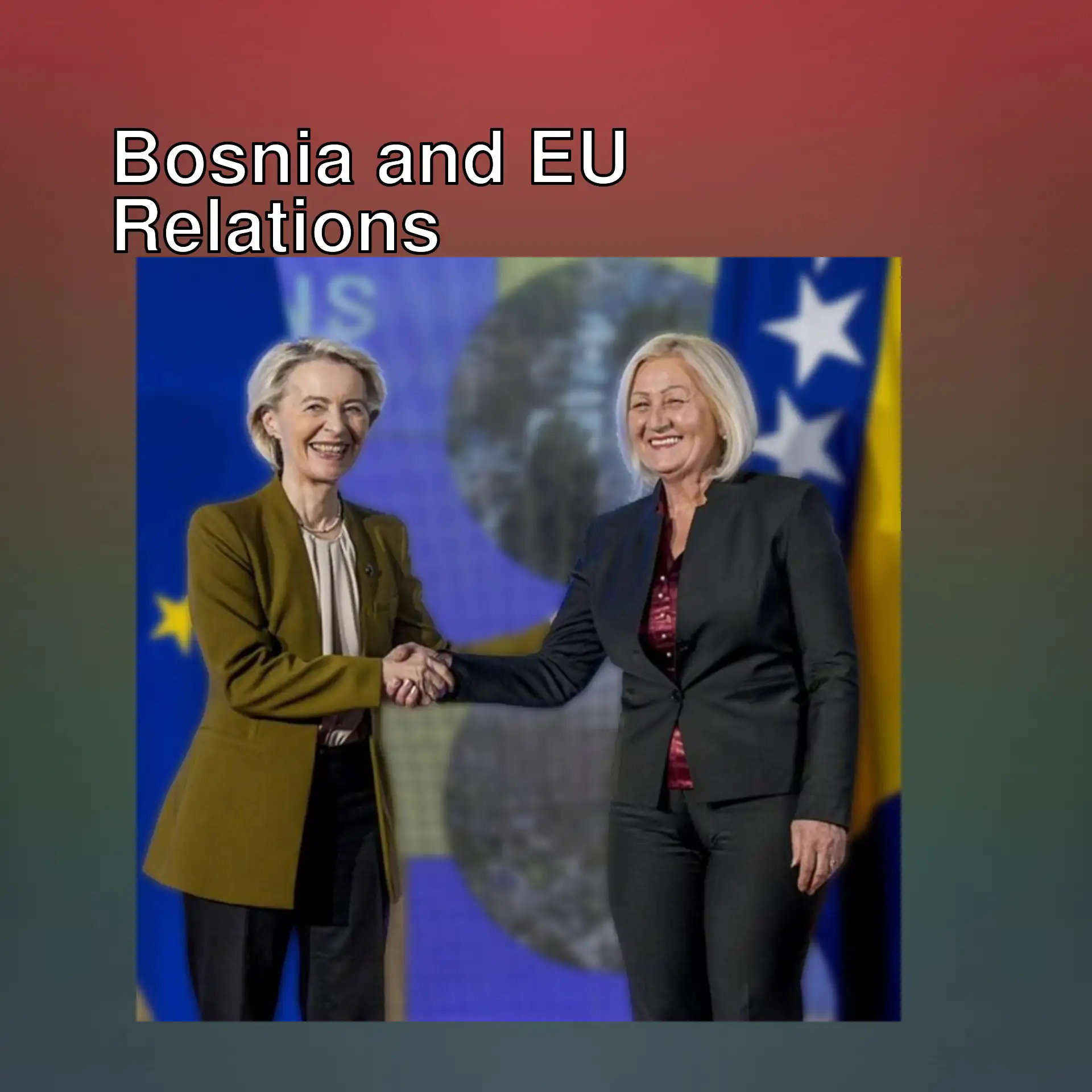 Two women shaking hands in front of flags. Two women shaking hands in front of flags.