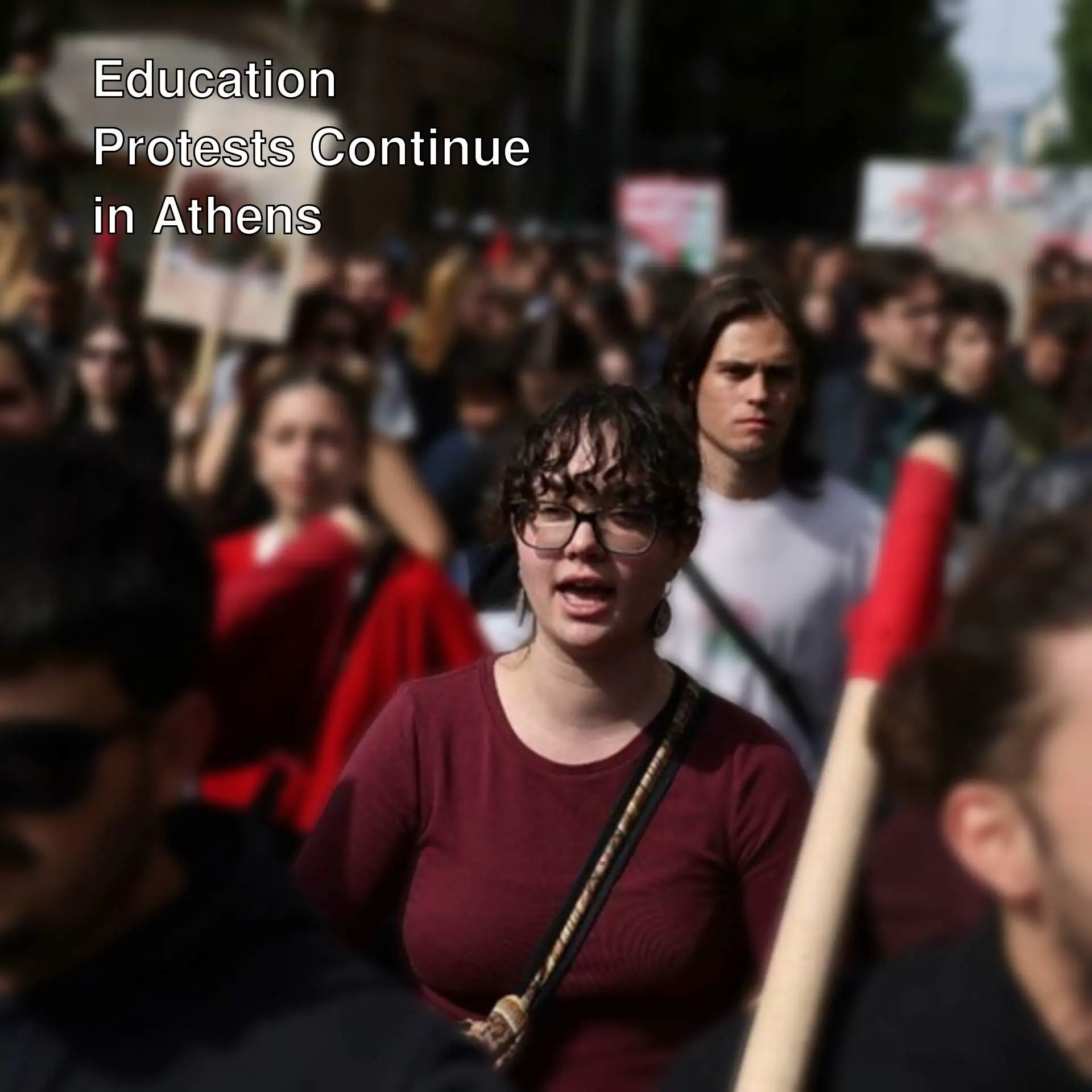 A group of people protesting in Athens. A group of people protesting in Athens.