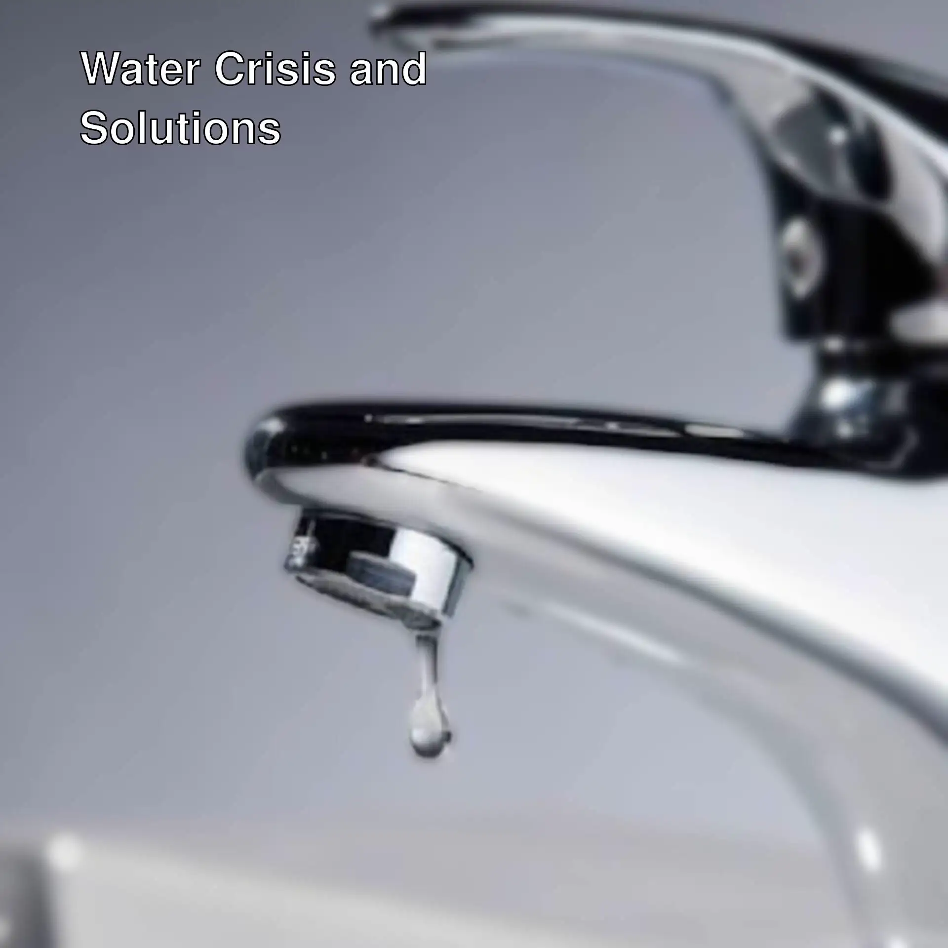 A faucet with a drop of water coming out of it A faucet with a drop of water coming out of it