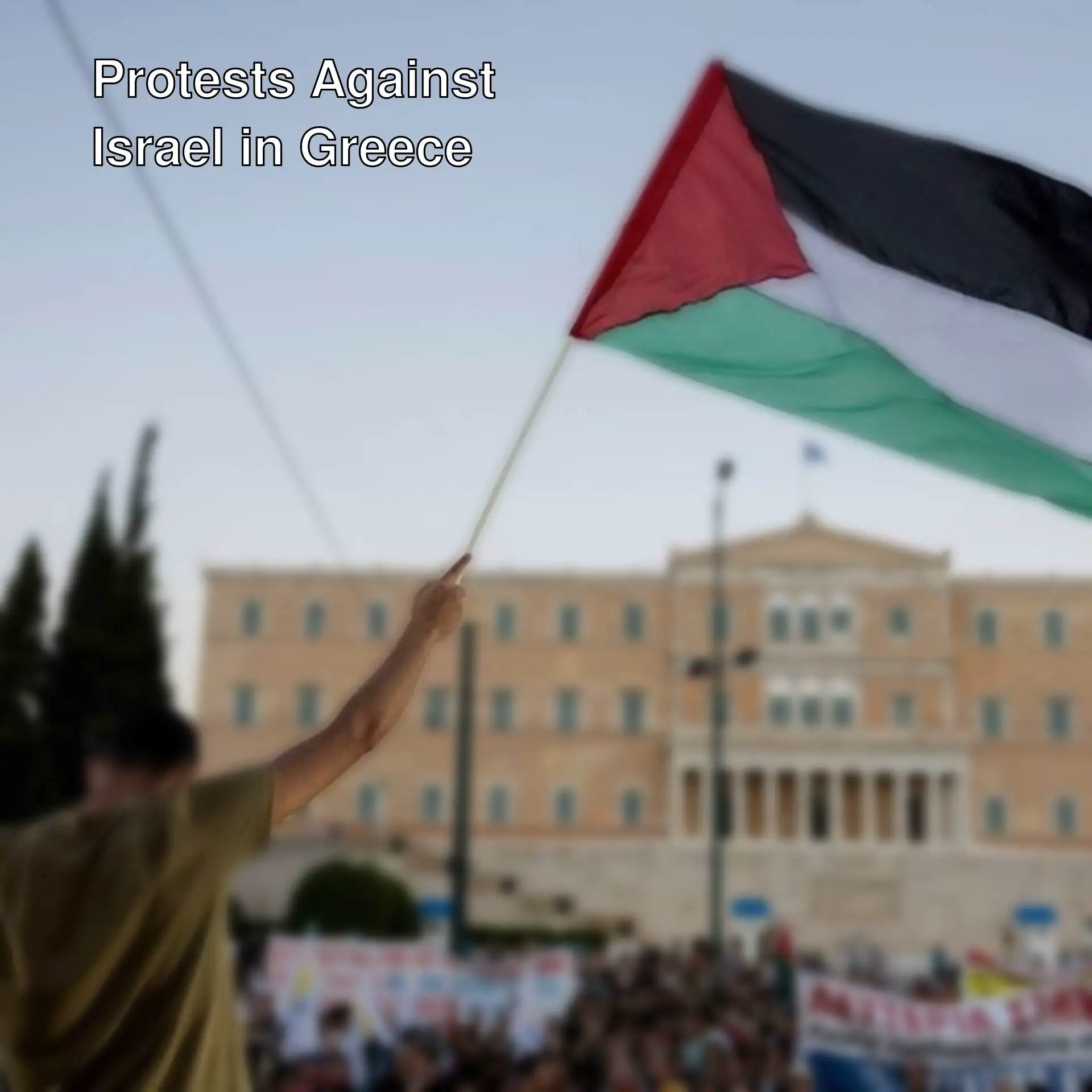 A man pointing at a flag during a protest in Greece. A man pointing at a flag during a protest in Greece.