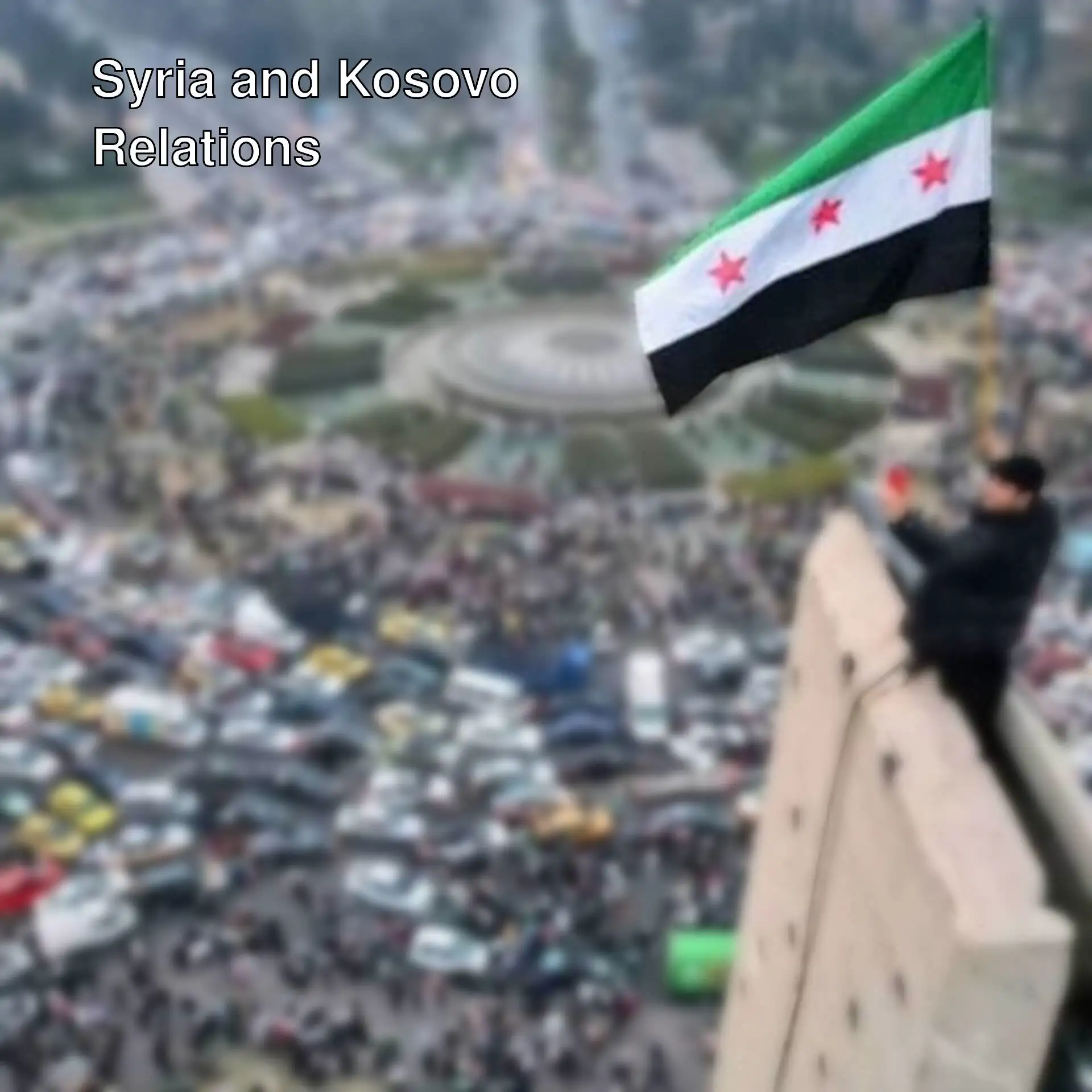 A man holding a flag on a building.
