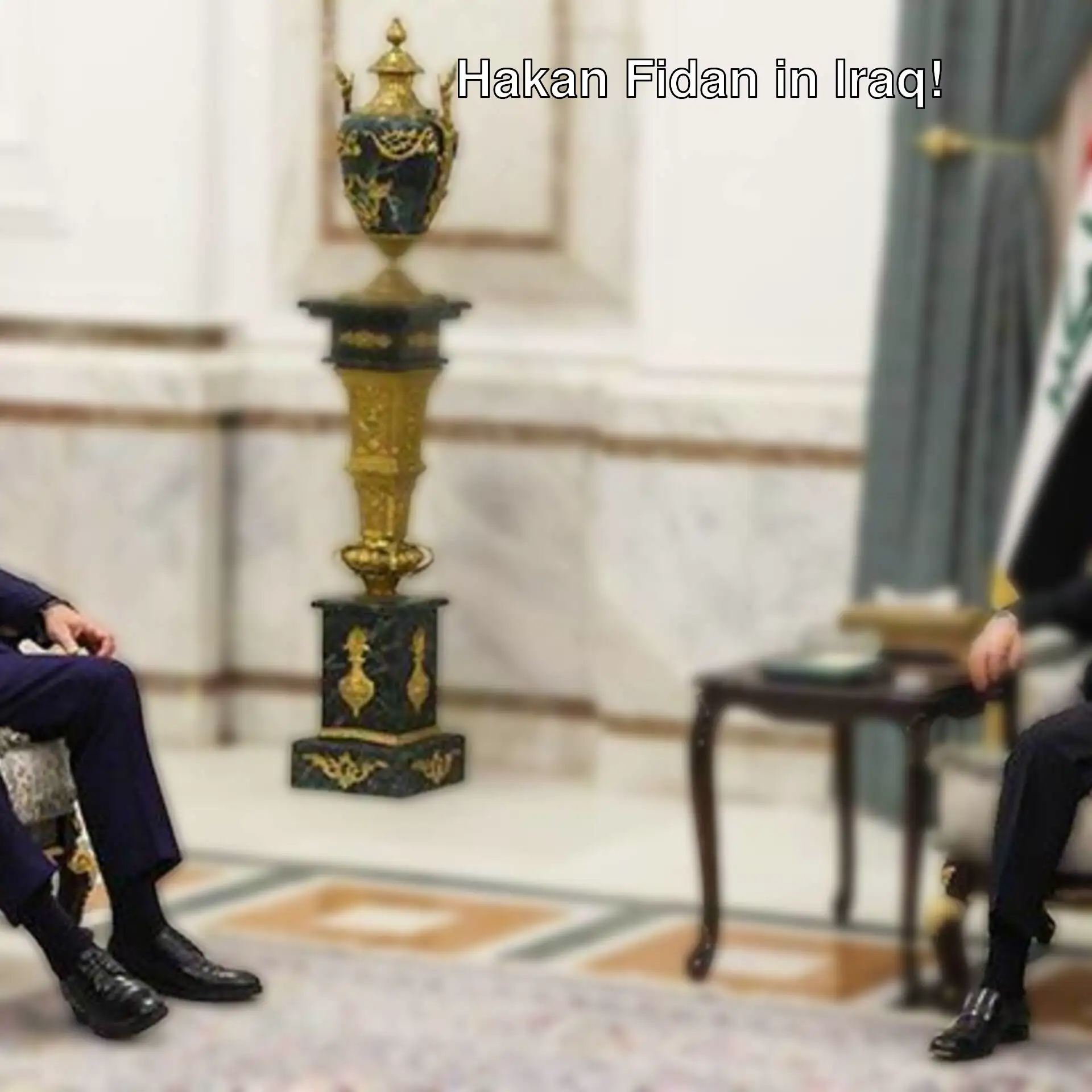 Foreign Minister Hakan Fidan and Iraqi President Abdullatif Rashid.