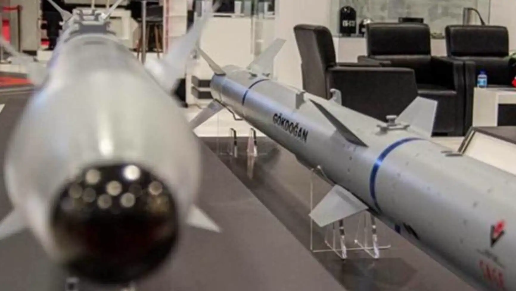 A model of a missile on display. A model of a missile on display.