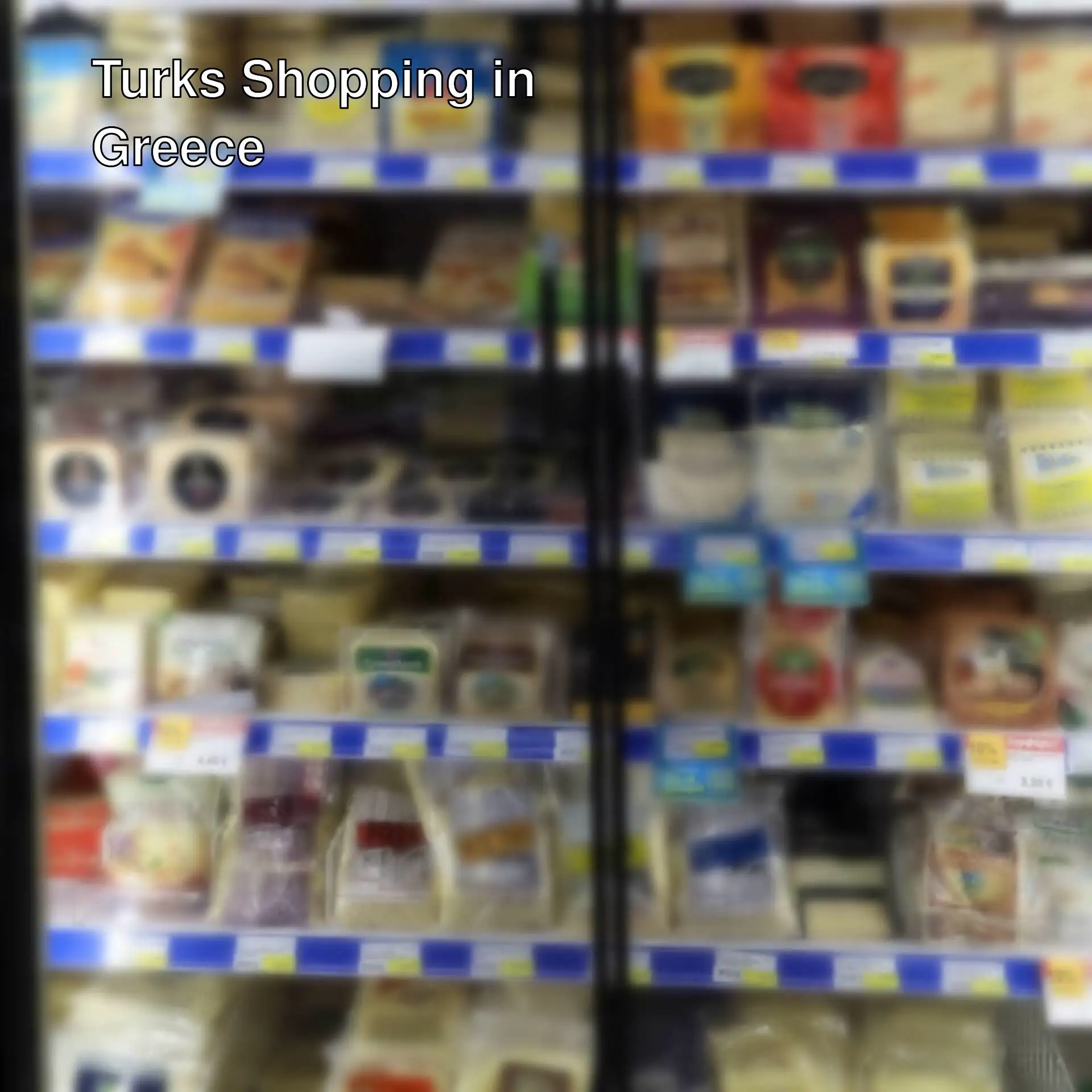 A display case of cheeses in Greece.