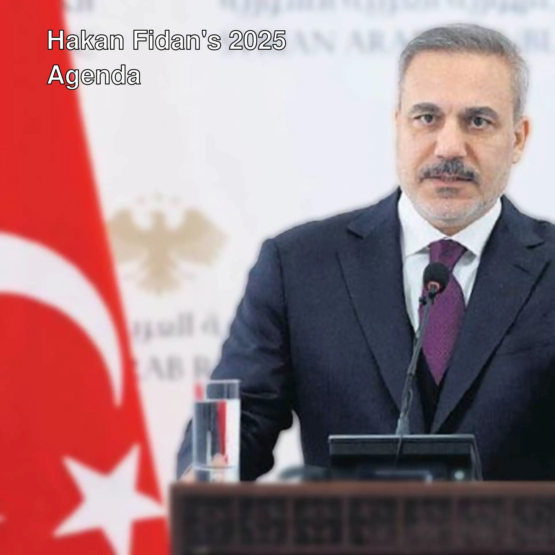 Foreign Minister Hakan Fidan standing at a podium.