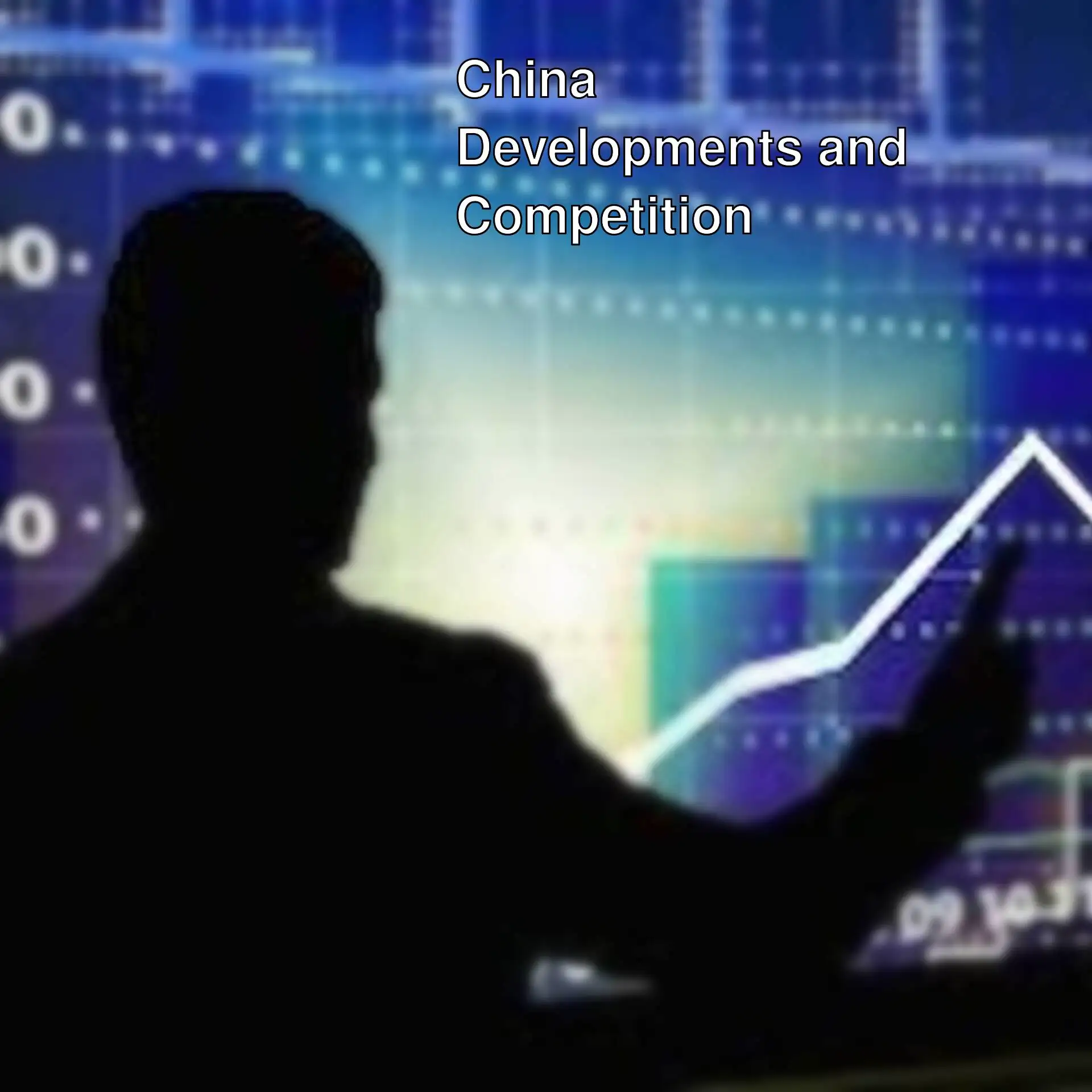 A man sitting at a desk.