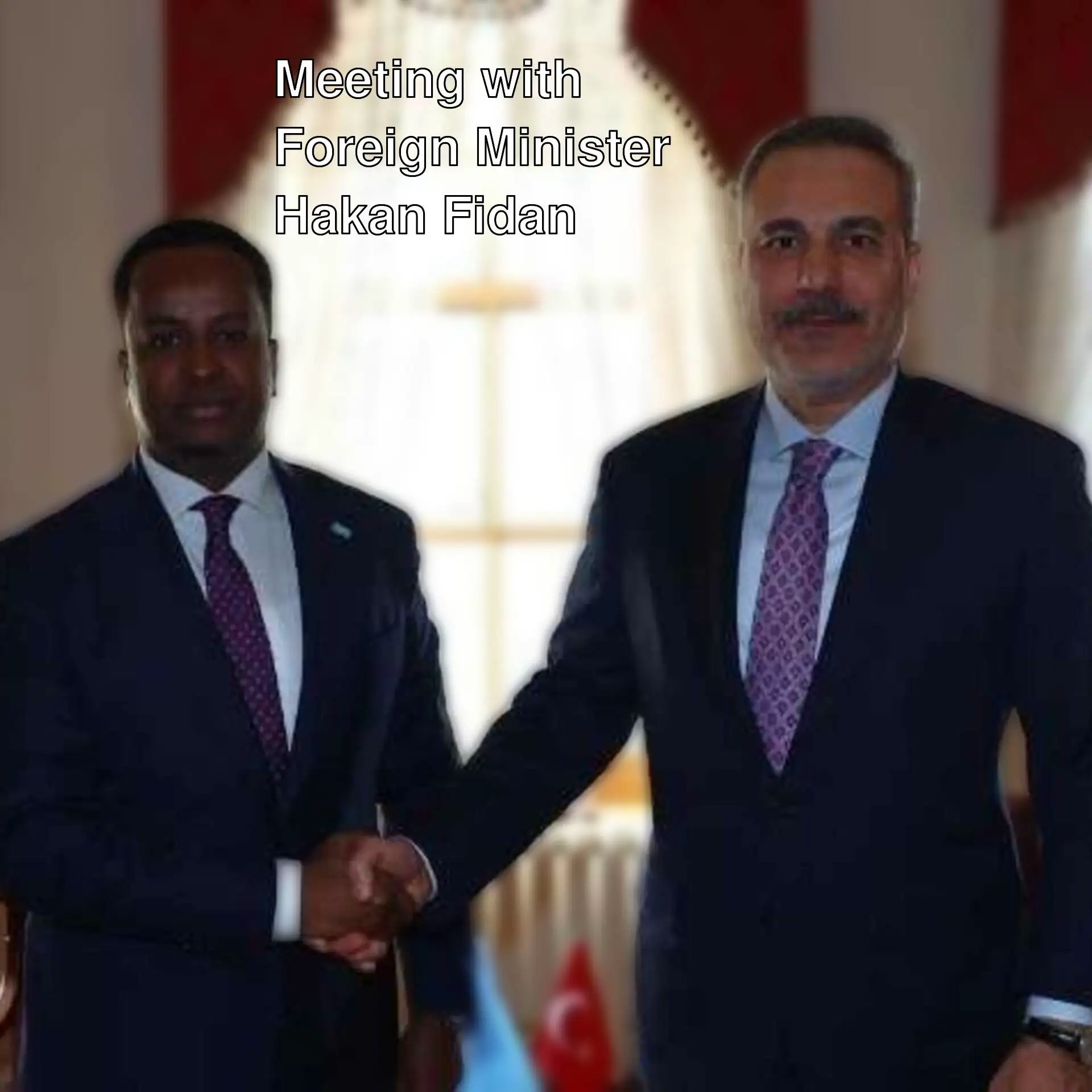 Foreign Minister Hakan Fidan and Somali counterpart shaking hands.