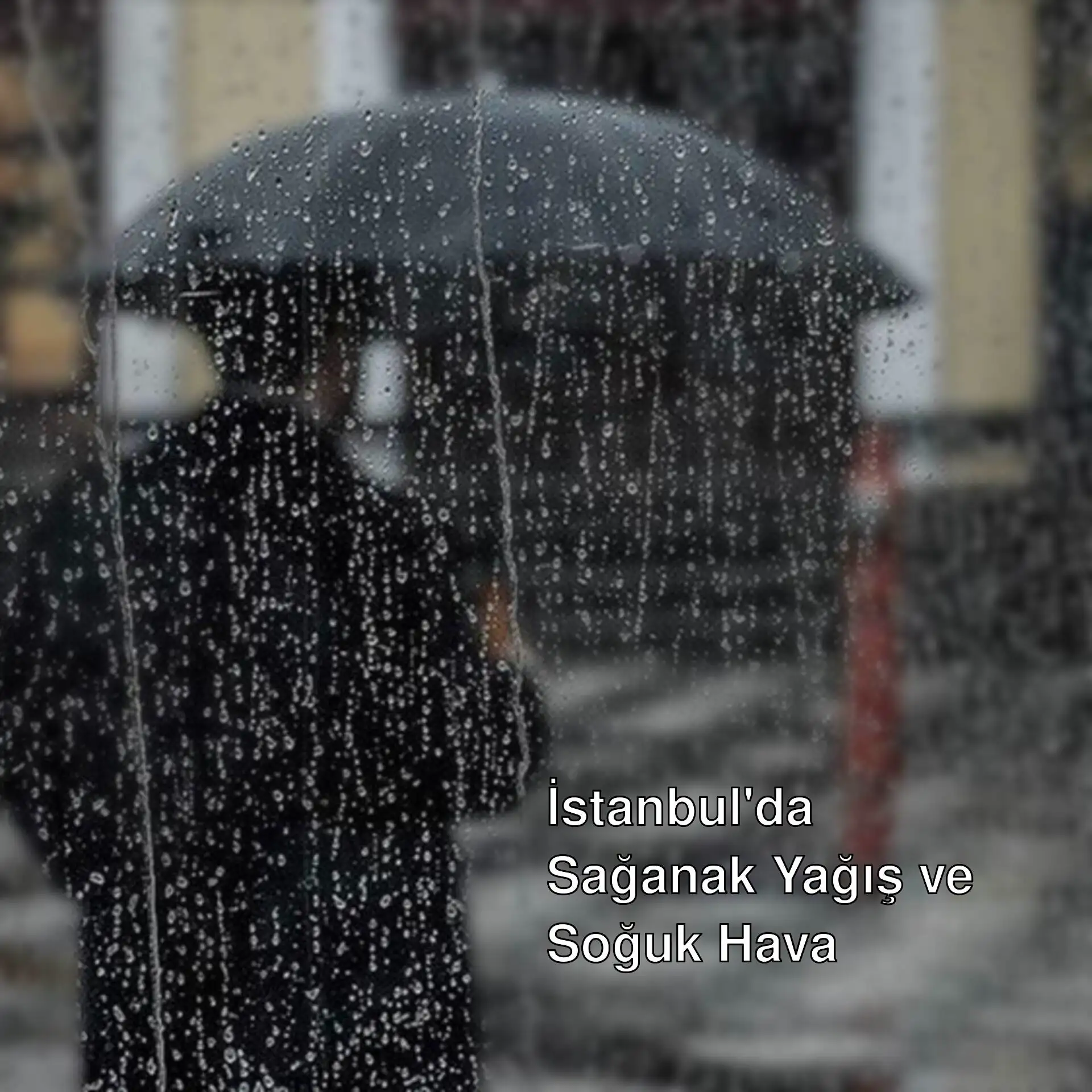 Bir kişi şemsiye tutuyor. Bir kişi şemsiye tutuyor.