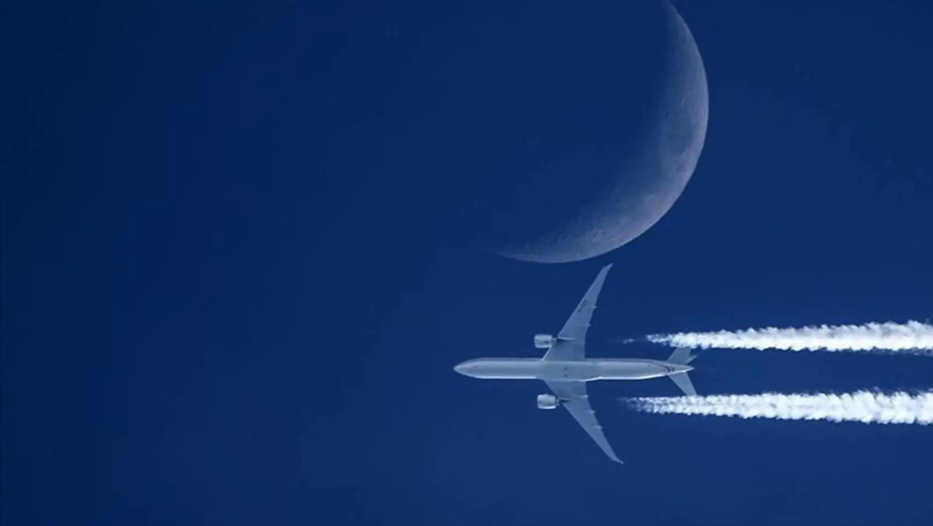 An airplane flying in the sky. Related to air traffic. An airplane flying in the sky. Related to air traffic.