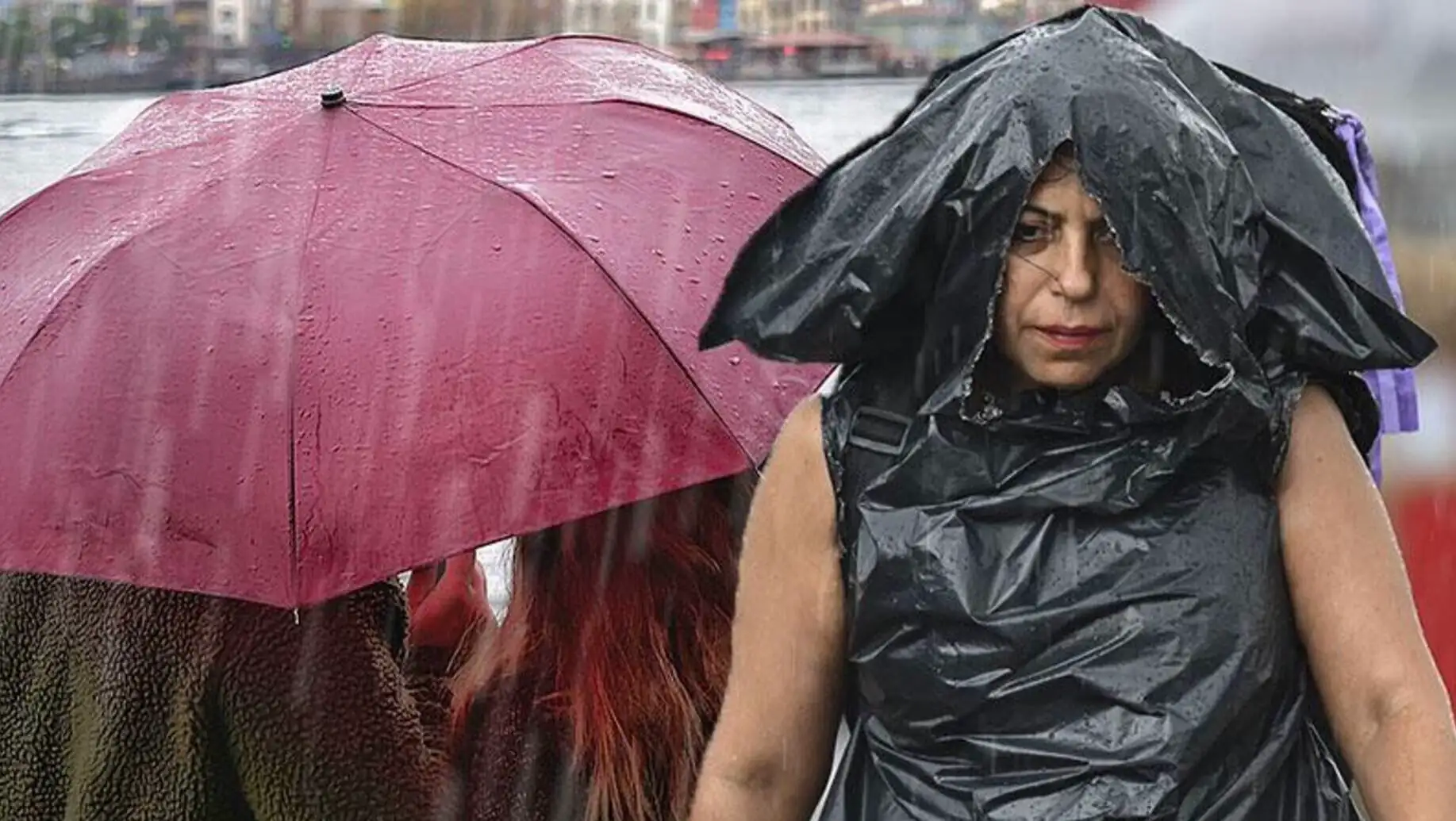 A woman in a raincoat with a pink umbrella.