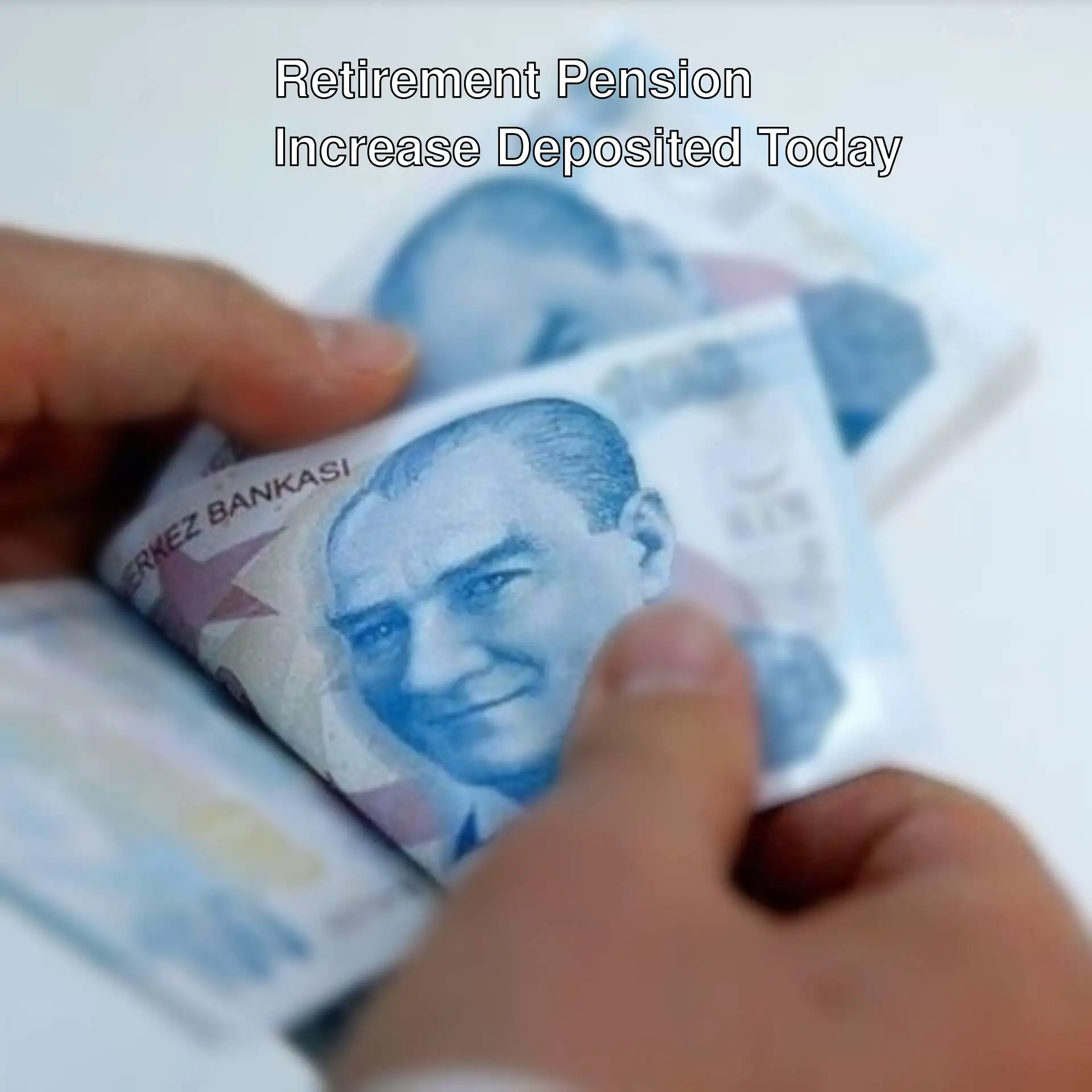 A person holding a stack of money. A person holding a stack of money.