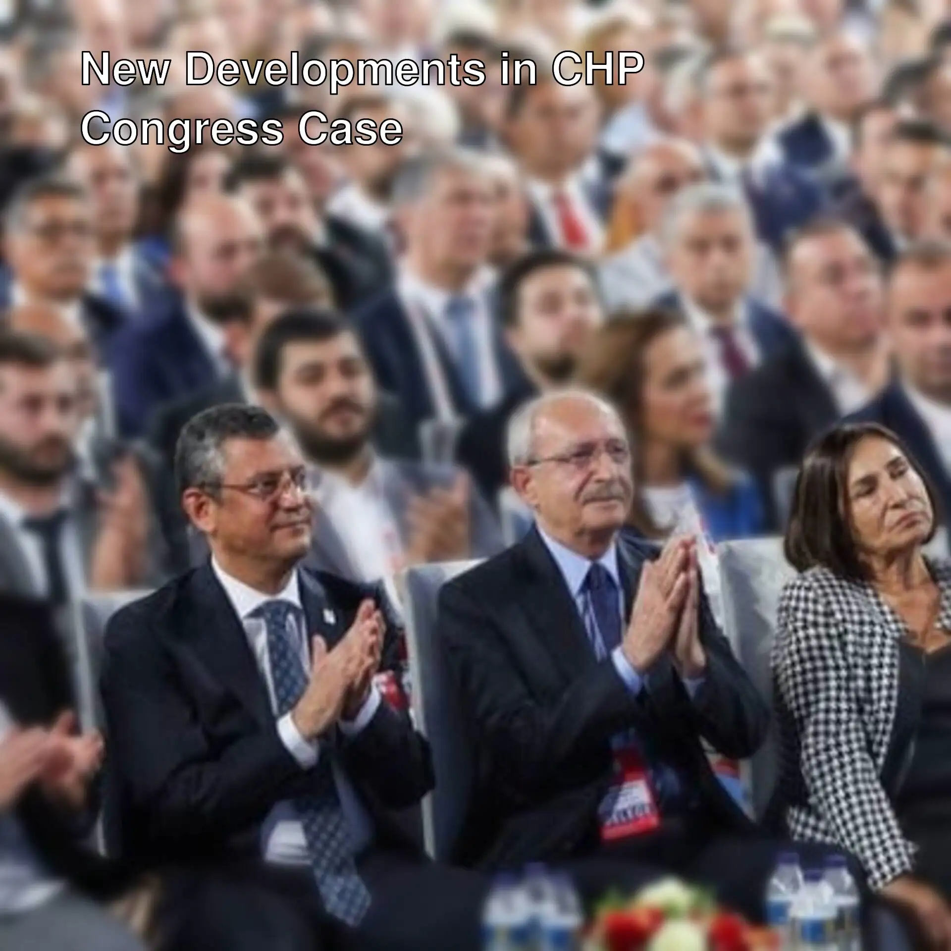 A group of people clapping. A group of people clapping.