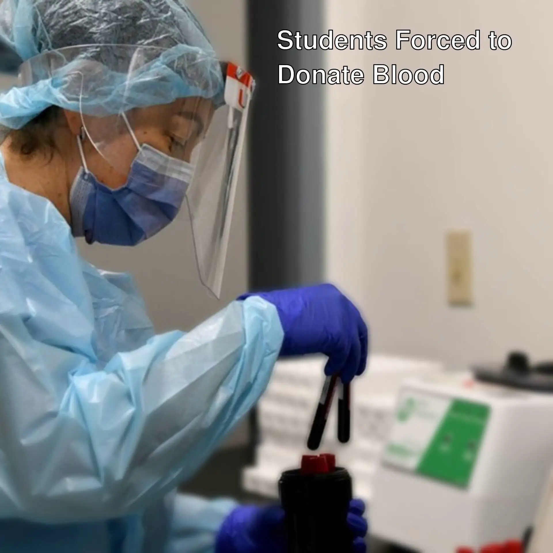 A woman in protective gear and face mask holding a test tube.