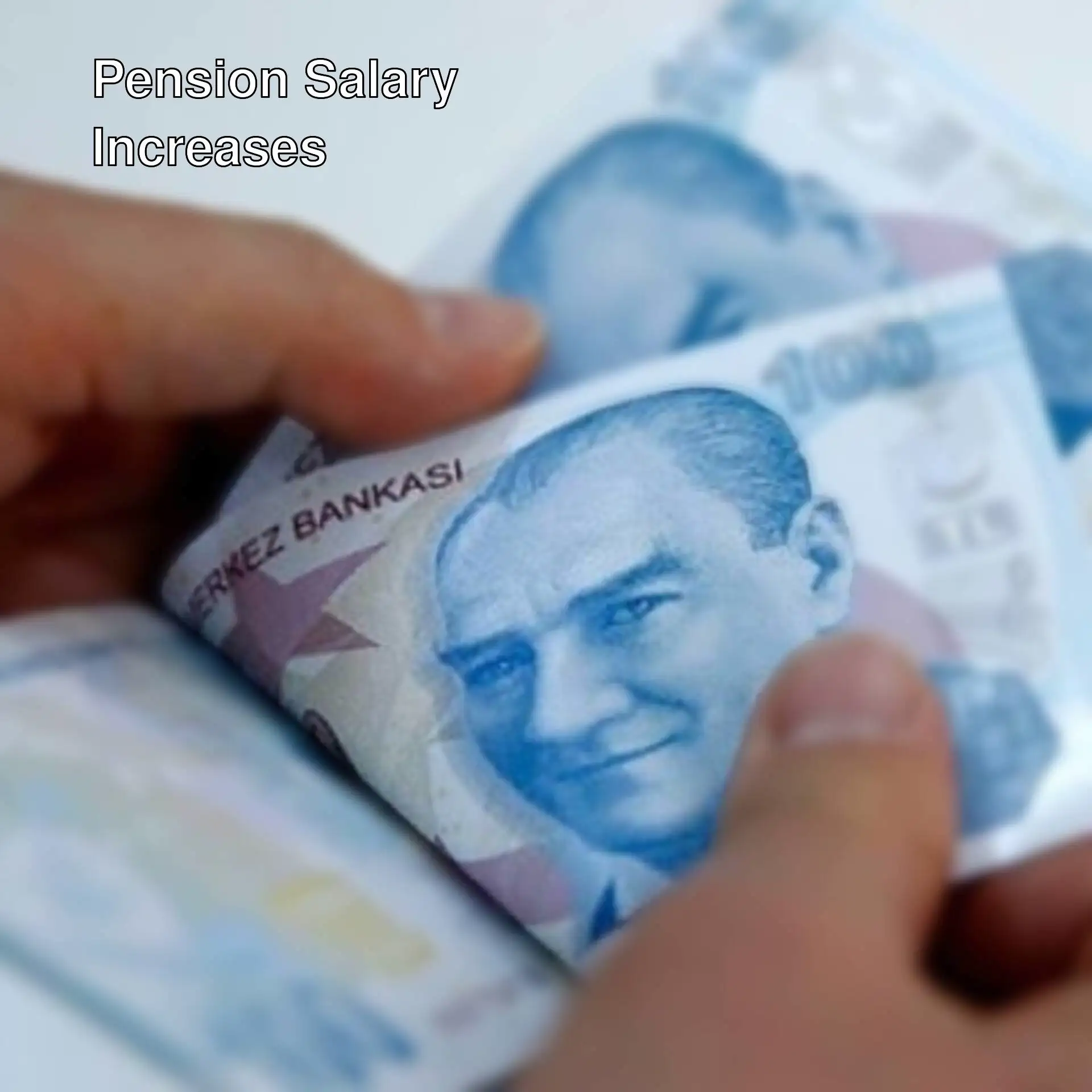 A person holding a stack of Turkish currency. A person holding a stack of Turkish currency.