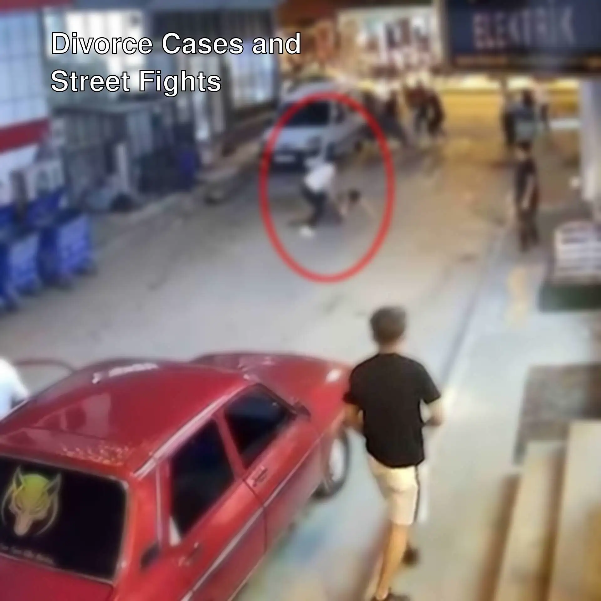 A group of people fighting on the street. A group of people fighting on the street.