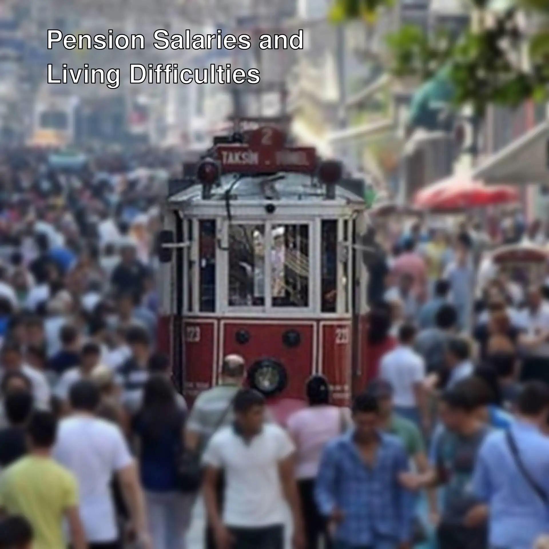 A group of people walking on the street. A group of people walking on the street.