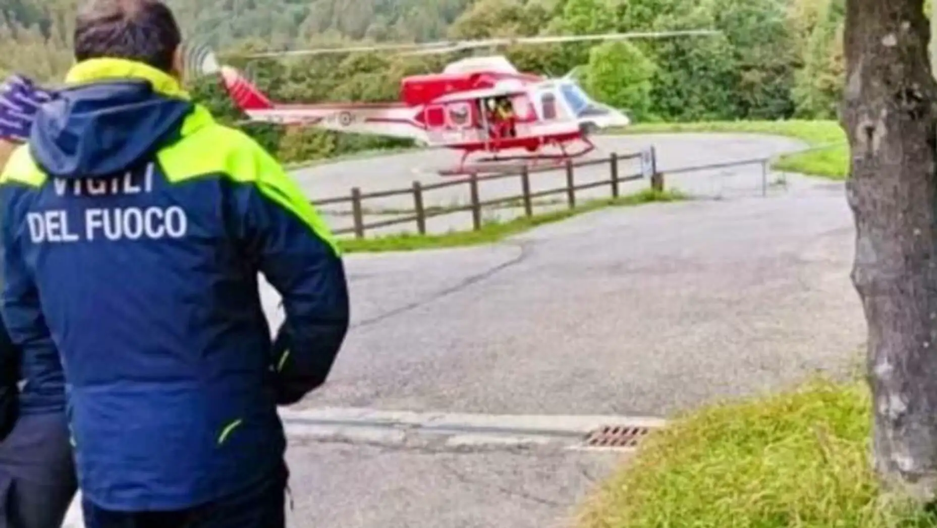 A man looking at a helicopter. A man looking at a helicopter.