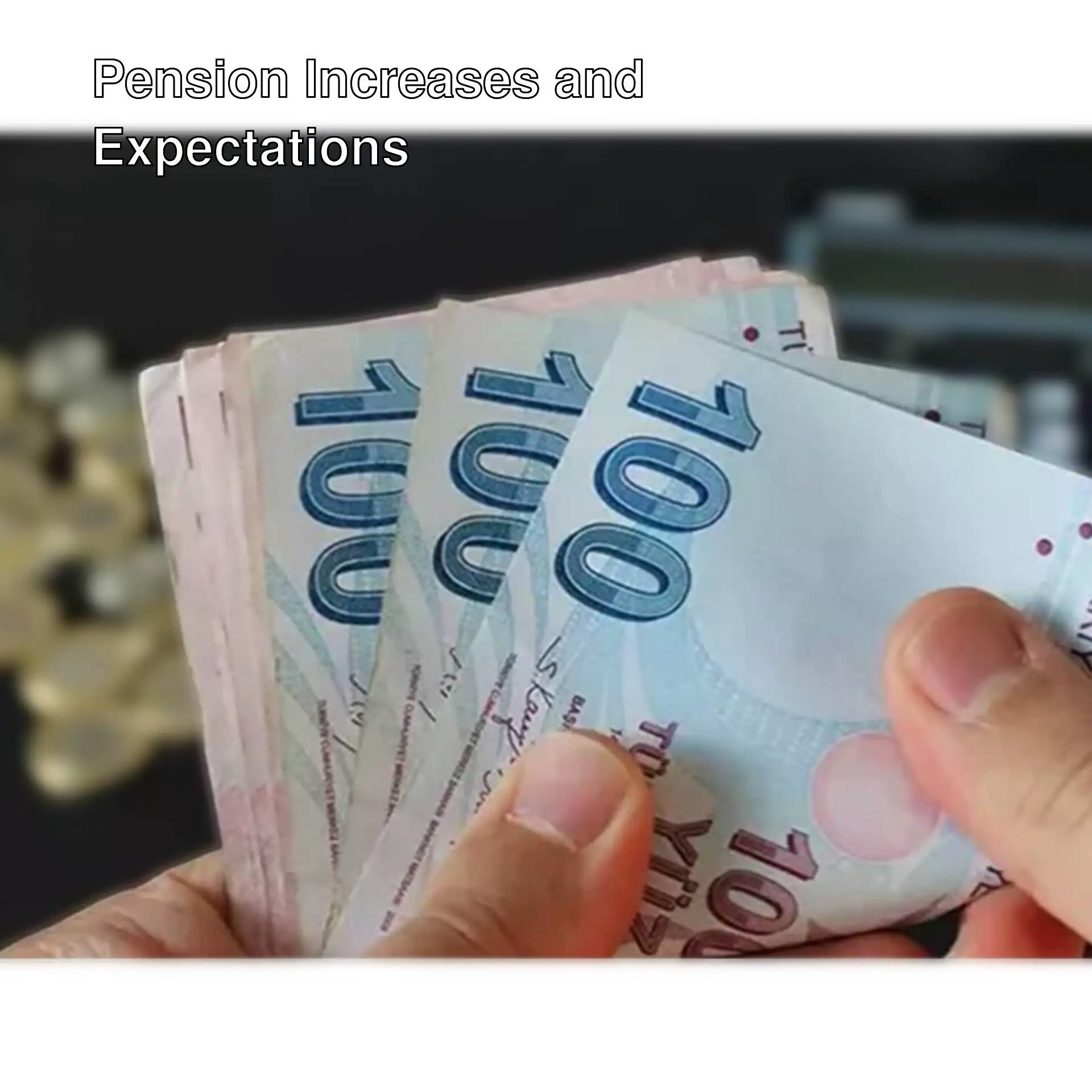 A hand holding a stack of Turkish lira. A hand holding a stack of Turkish lira.