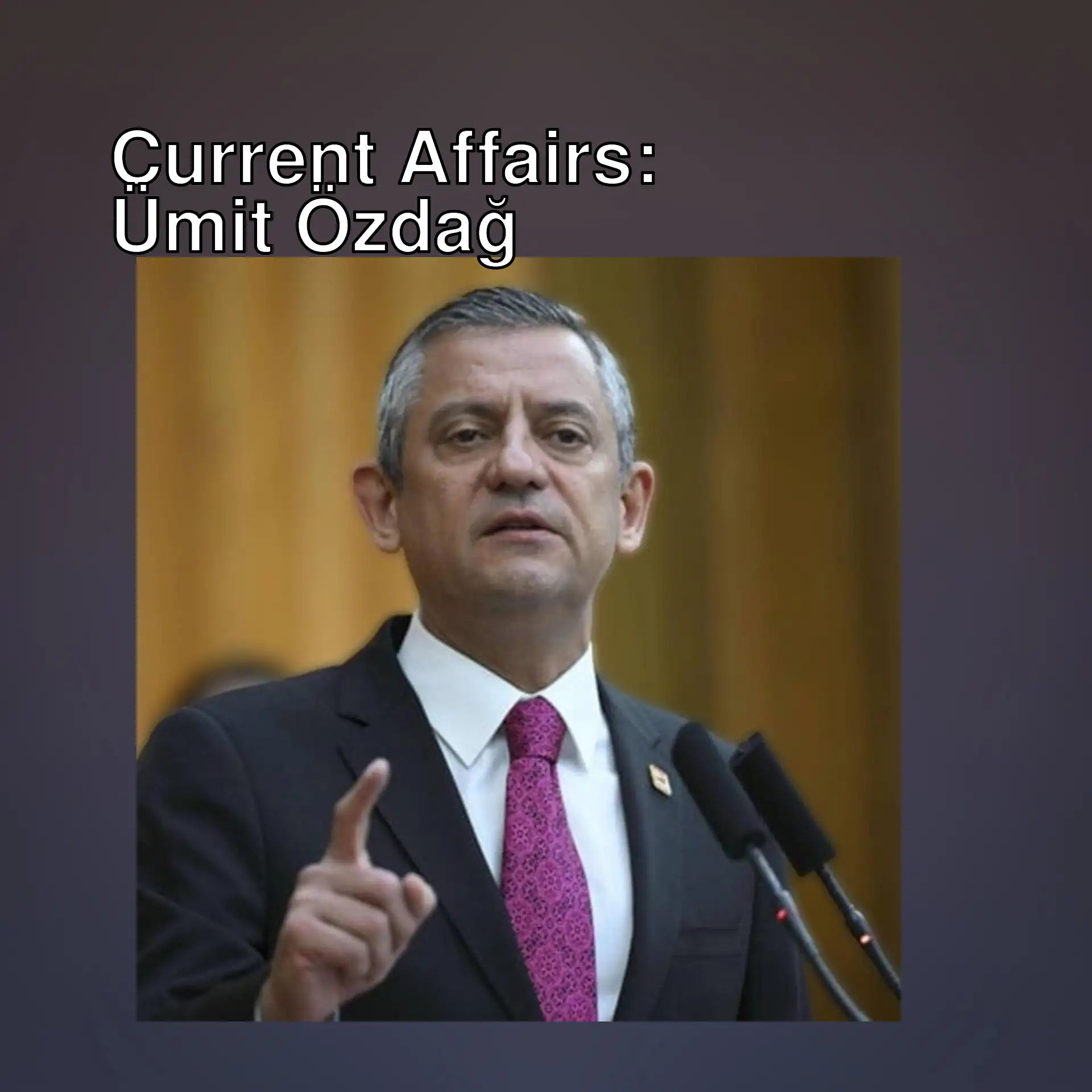 Özgür Özel, a man pointing at a microphone.