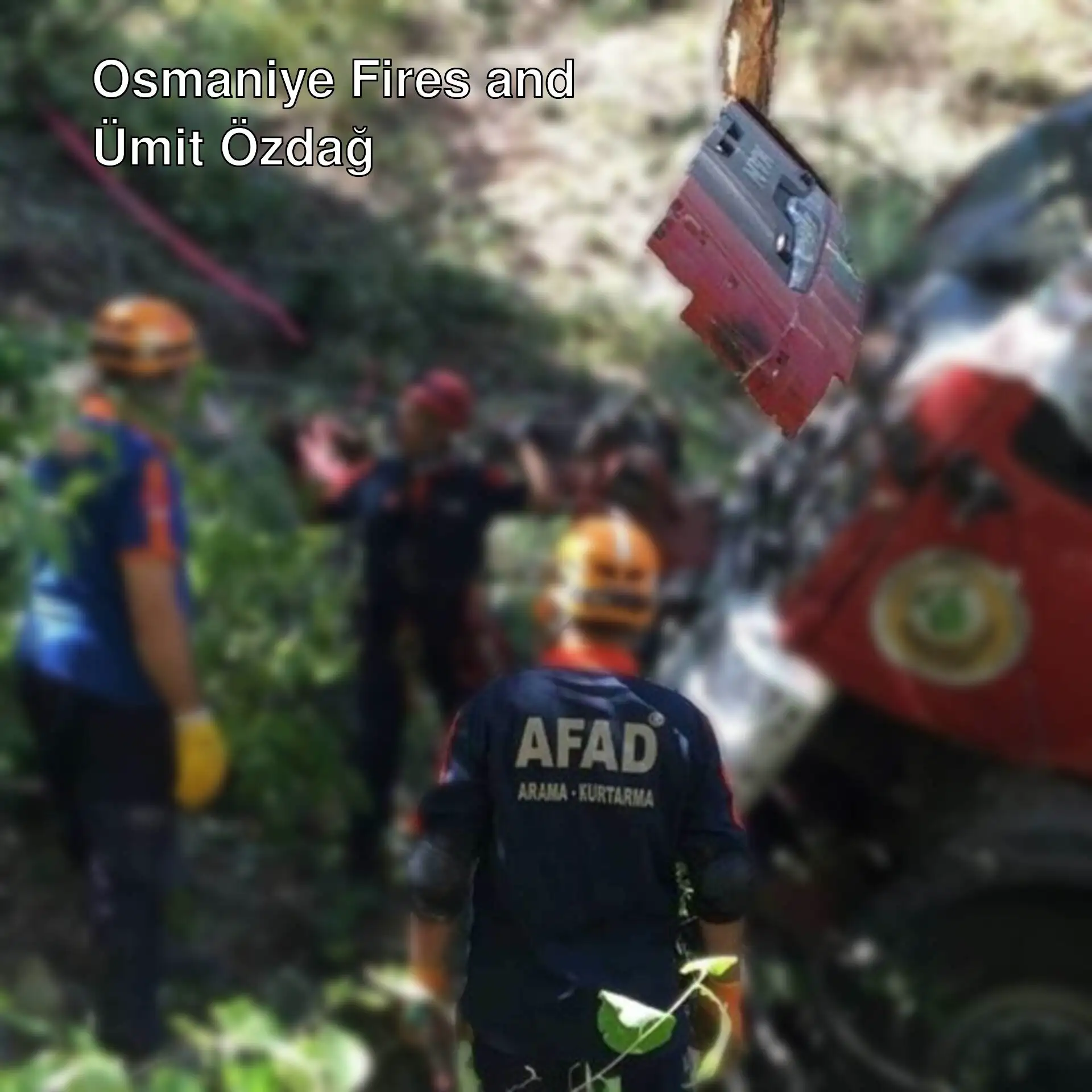 A group of people around a wrecked vehicle in Osmaniye. A group of people around a wrecked vehicle in Osmaniye.