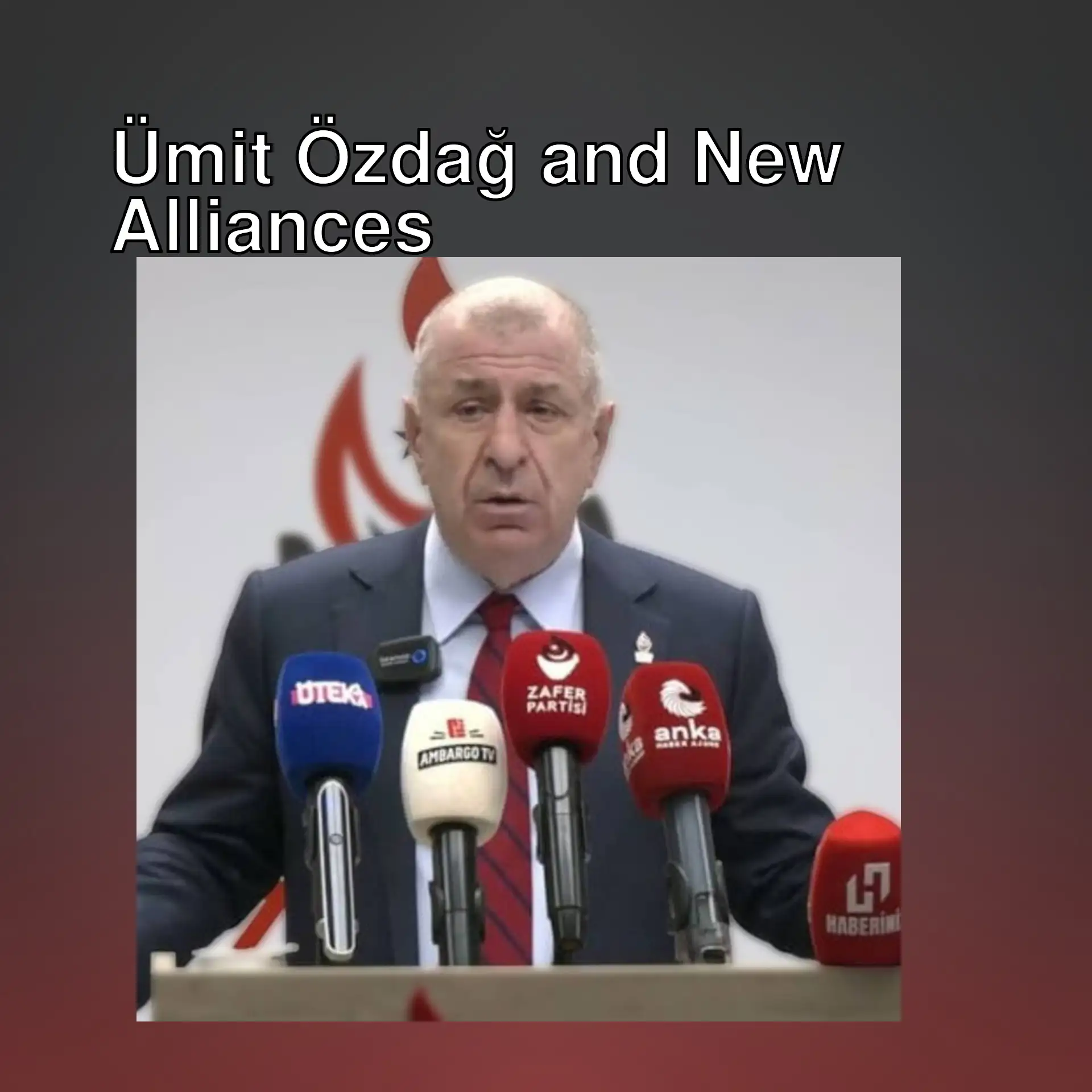 Ümit Özdağ speaking into microphones. Ümit Özdağ speaking into microphones.