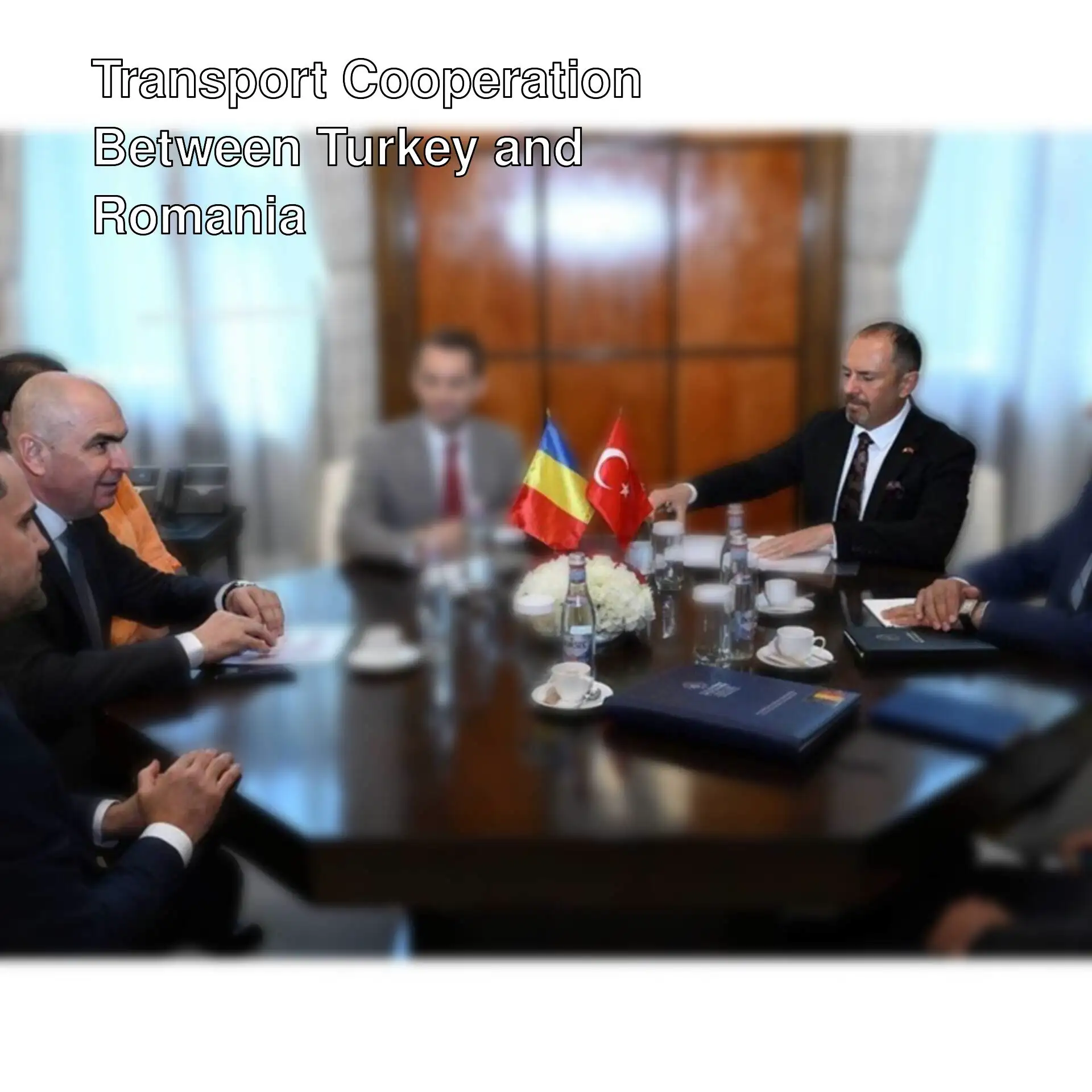 A group of men sitting around a table. A group of men sitting around a table.