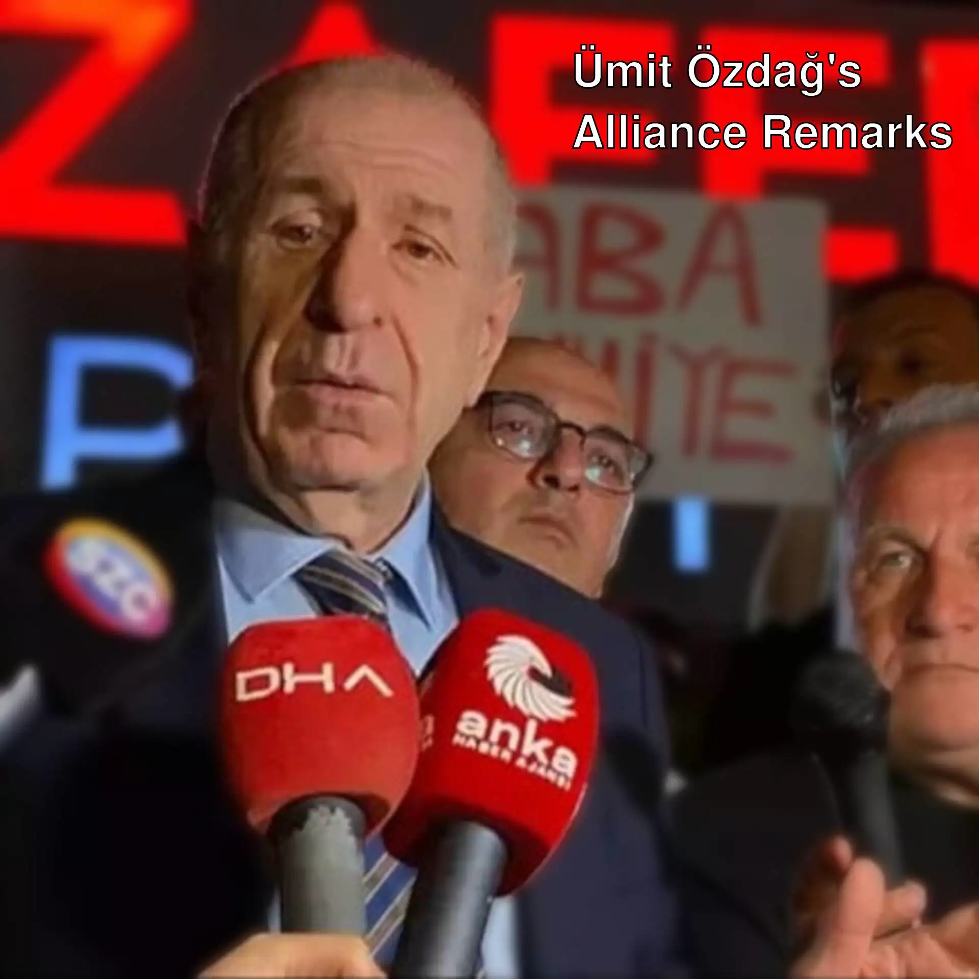 Ümit Özdağ speaking into microphones. Ümit Özdağ speaking into microphones.