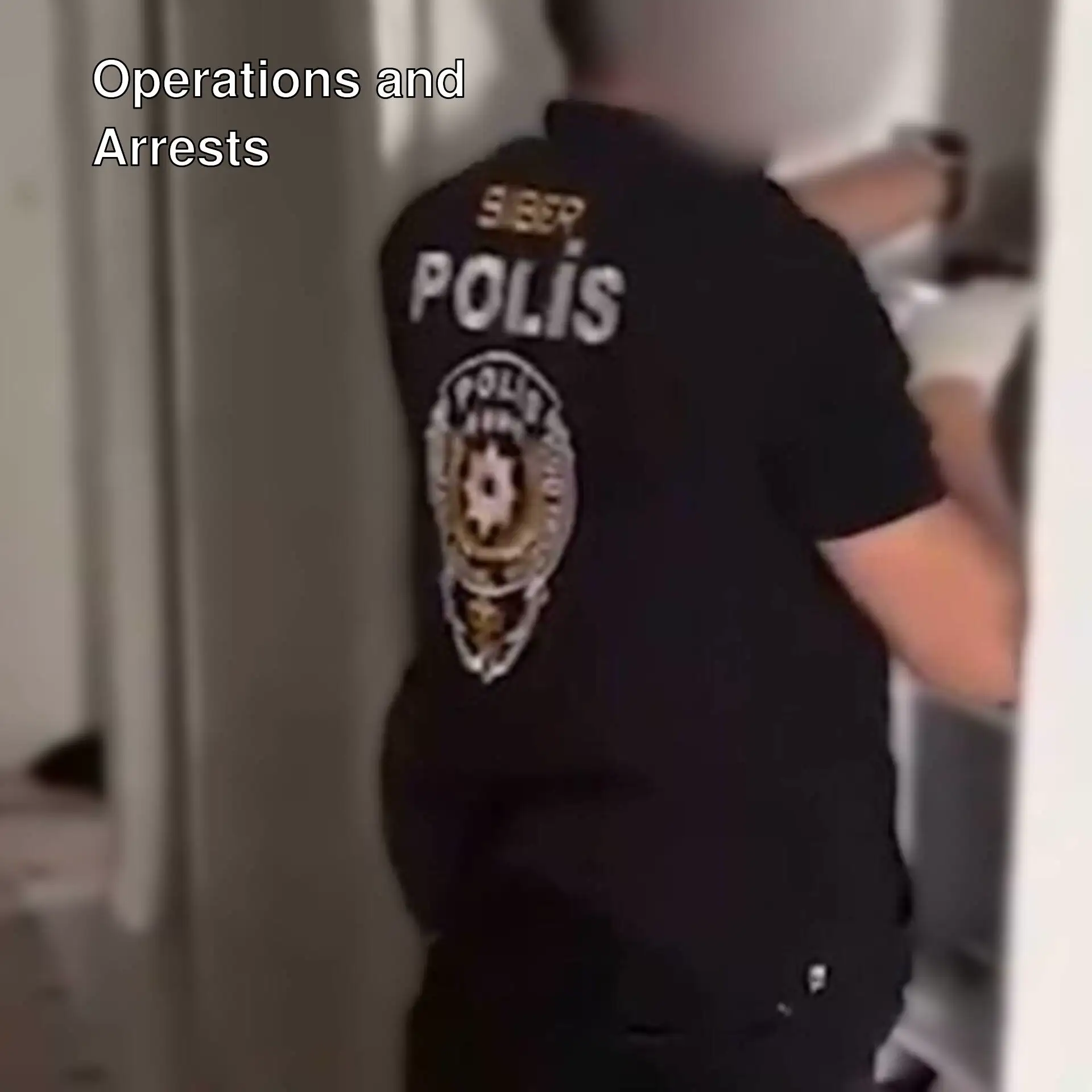 A person in a black shirt. A person in a black shirt.
