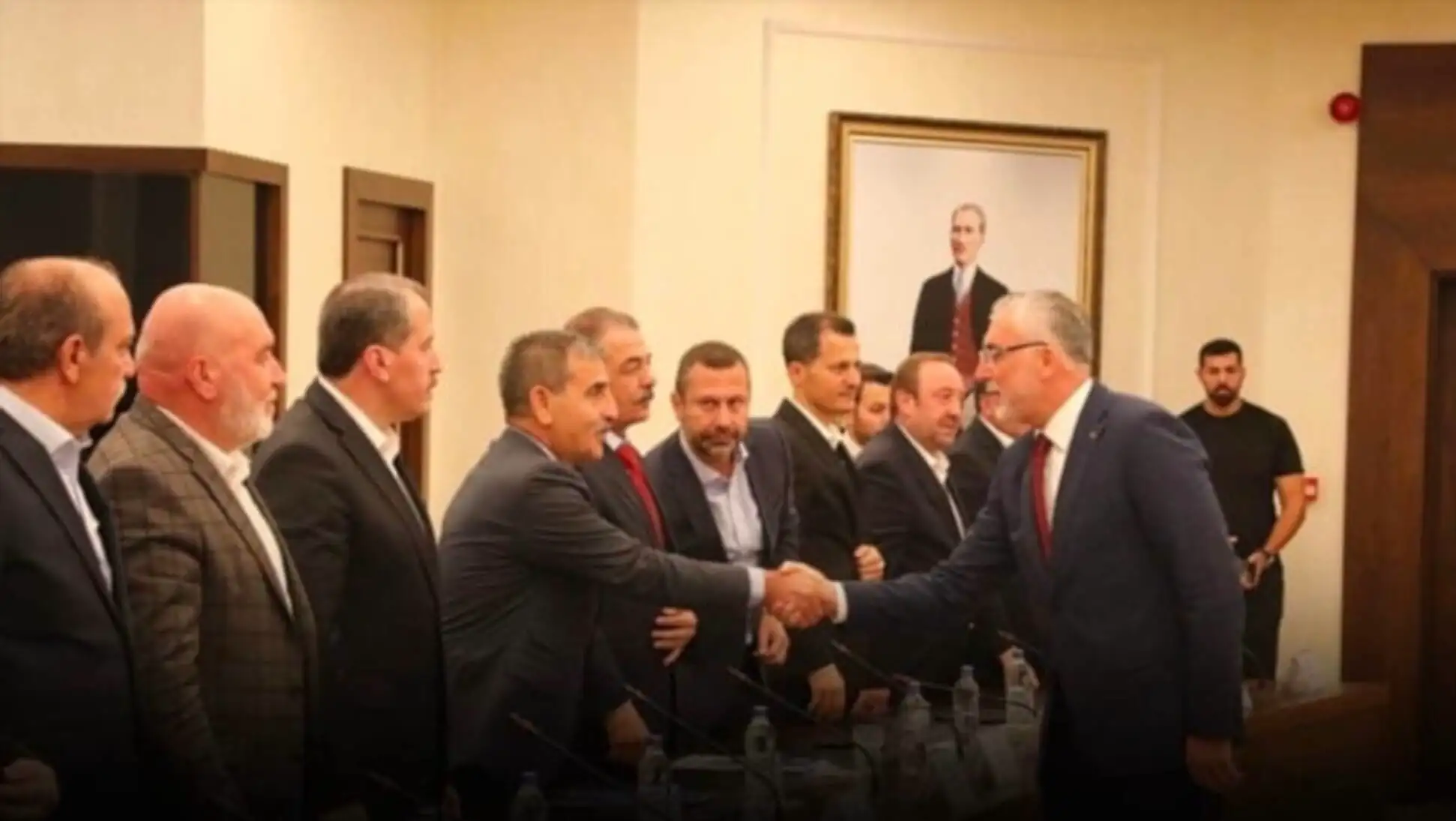 A group of men shaking hands. A group of men shaking hands.