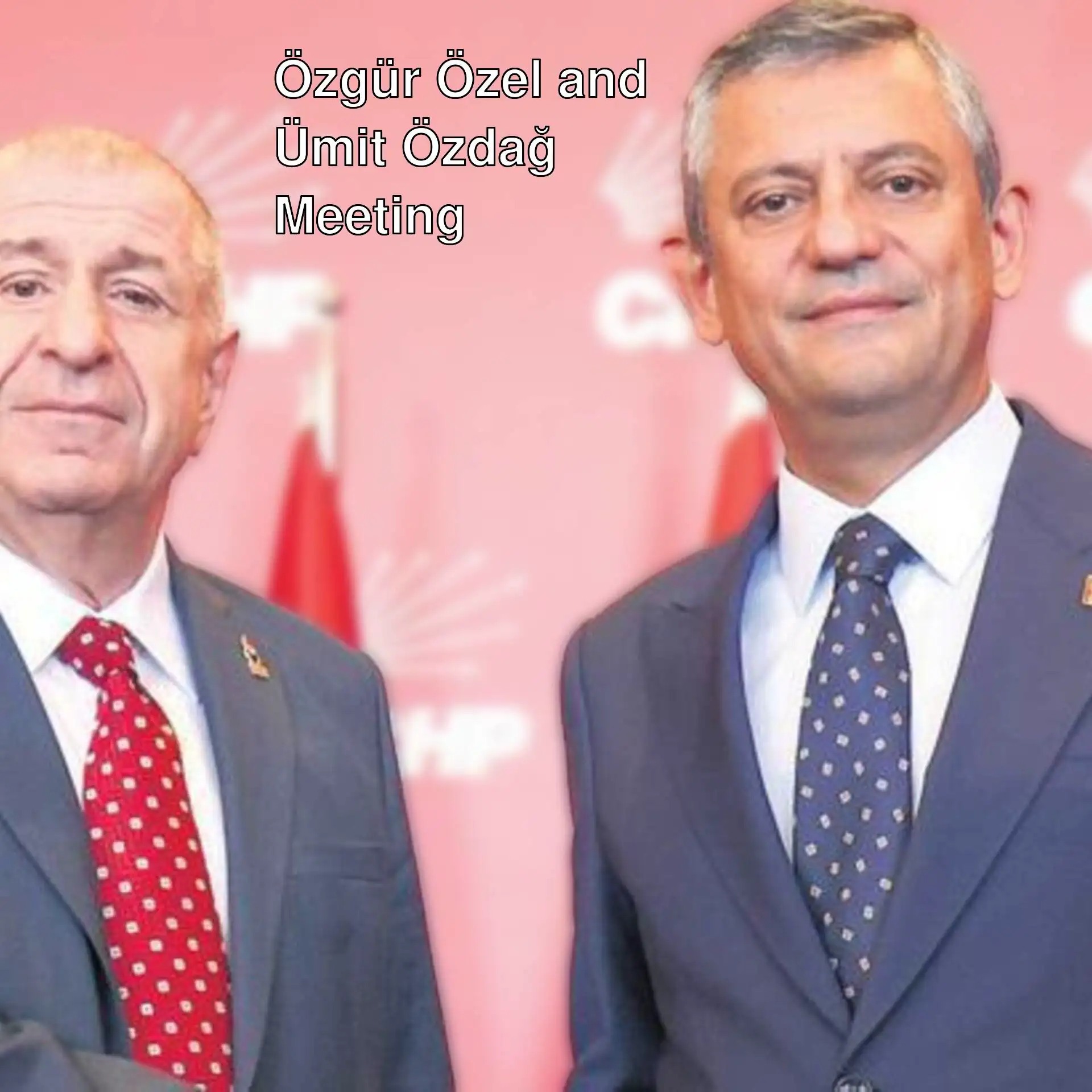 Two men in suits standing in front of a red background.