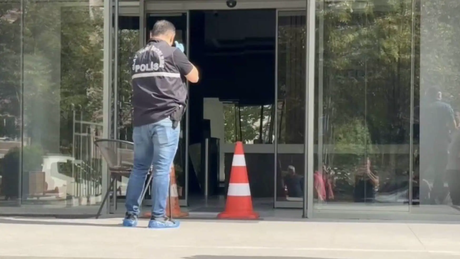 A man standing outside a building related to a divorce case.