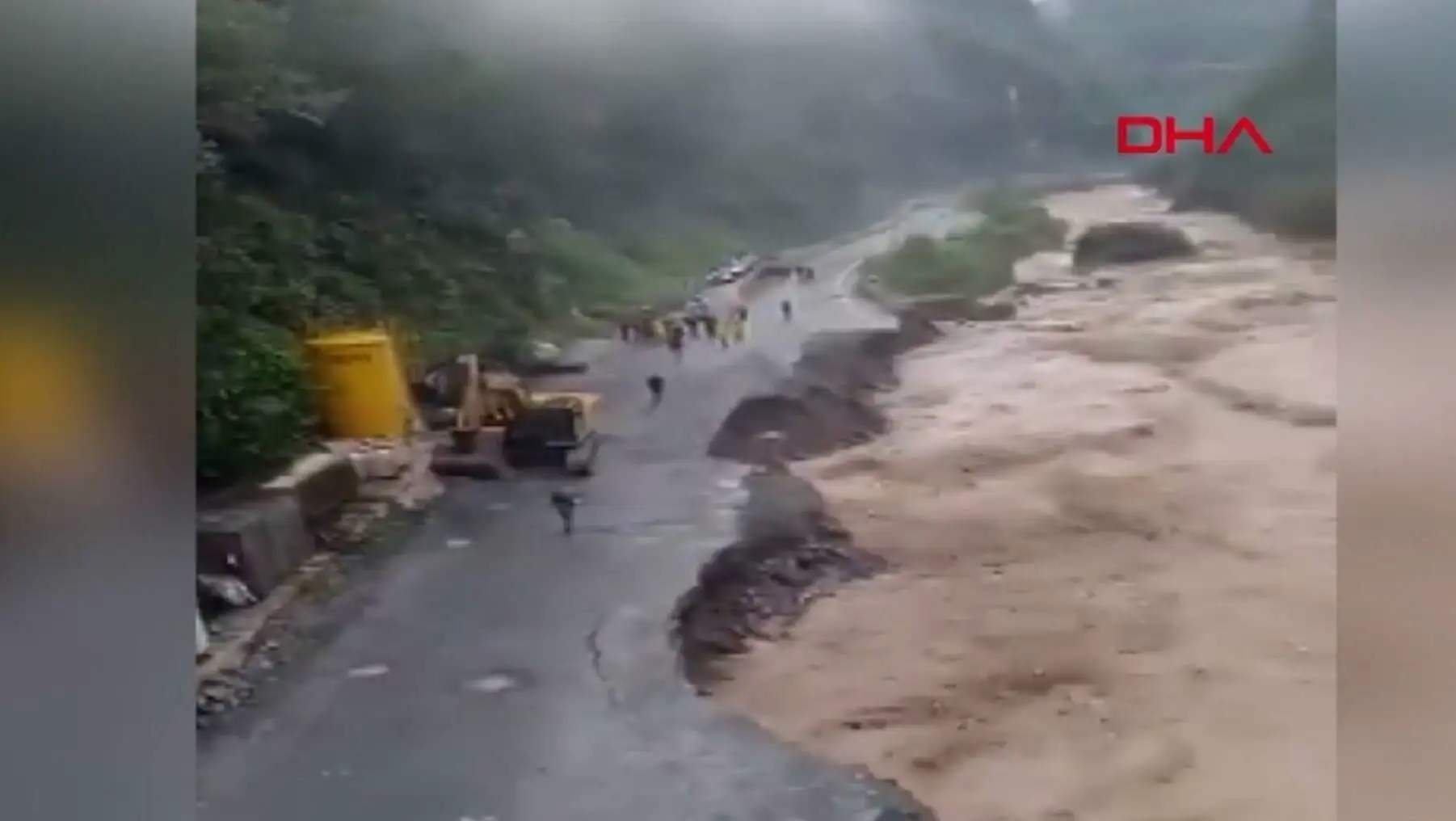 A road with a large crack in the ground.