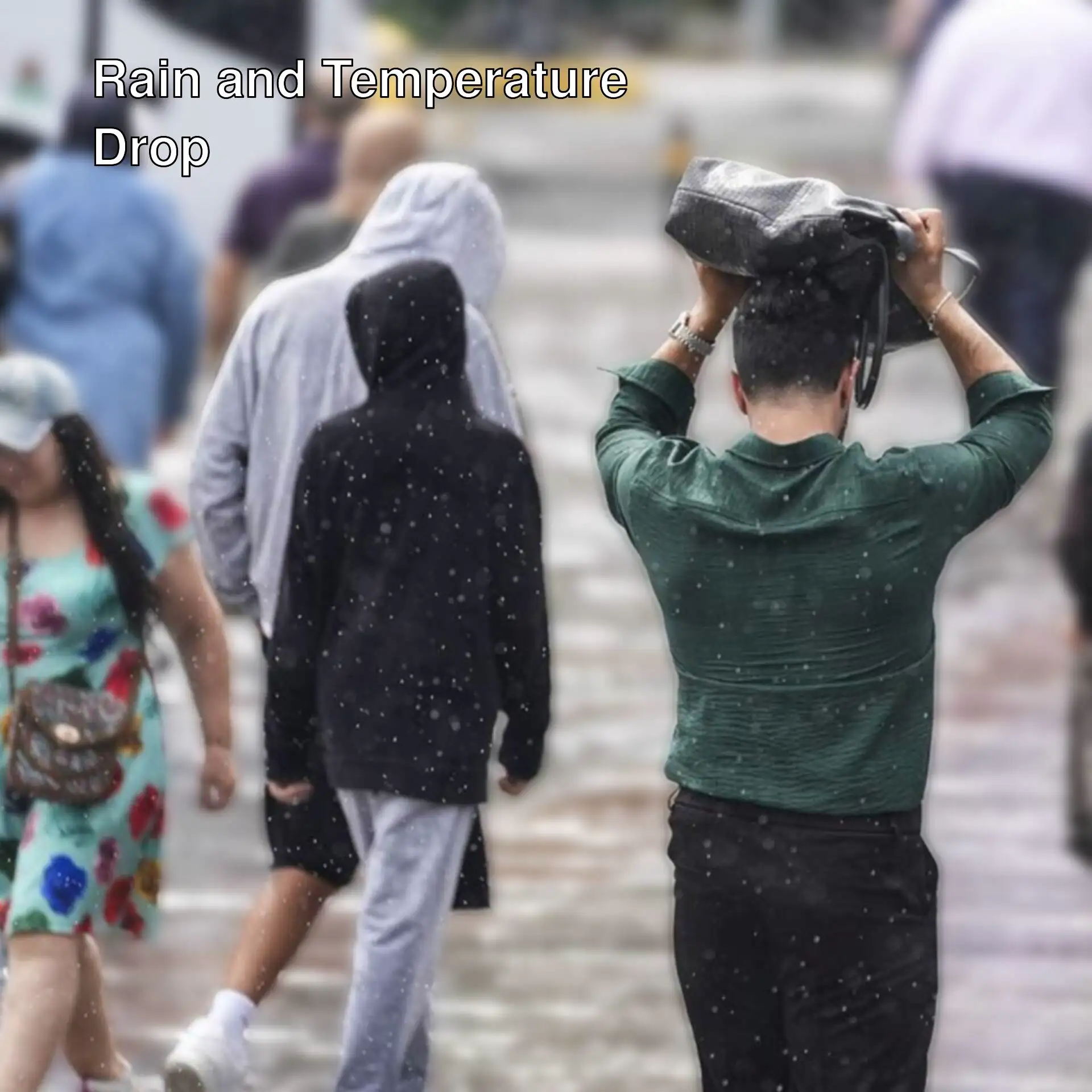 A man holding a bag on his head while walking in the rain.