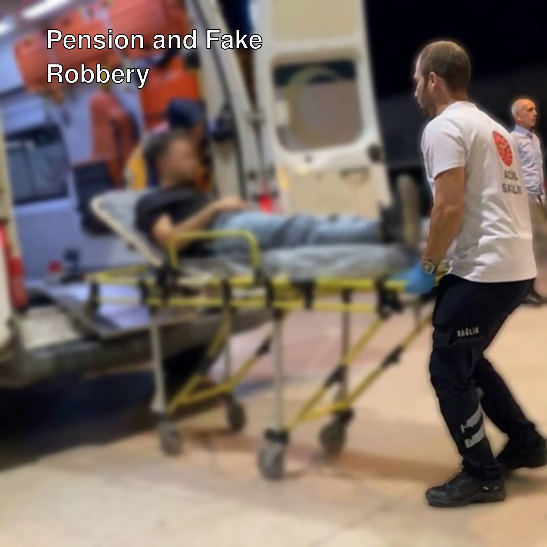 A man on a stretcher.