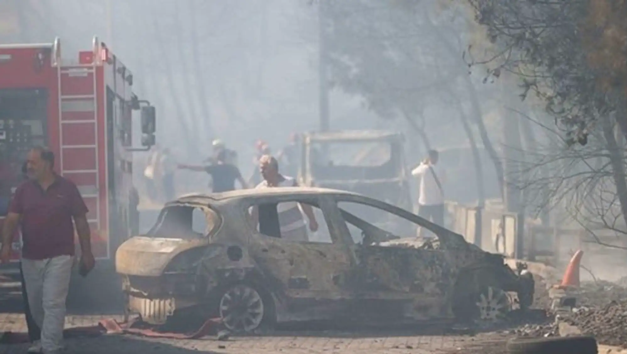 A burnt vehicle after the fire incident. A burnt vehicle after the fire incident.