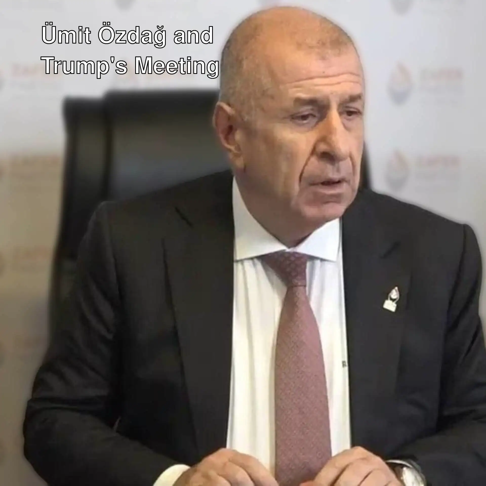 Ümit Özdağ speaking at a meeting.