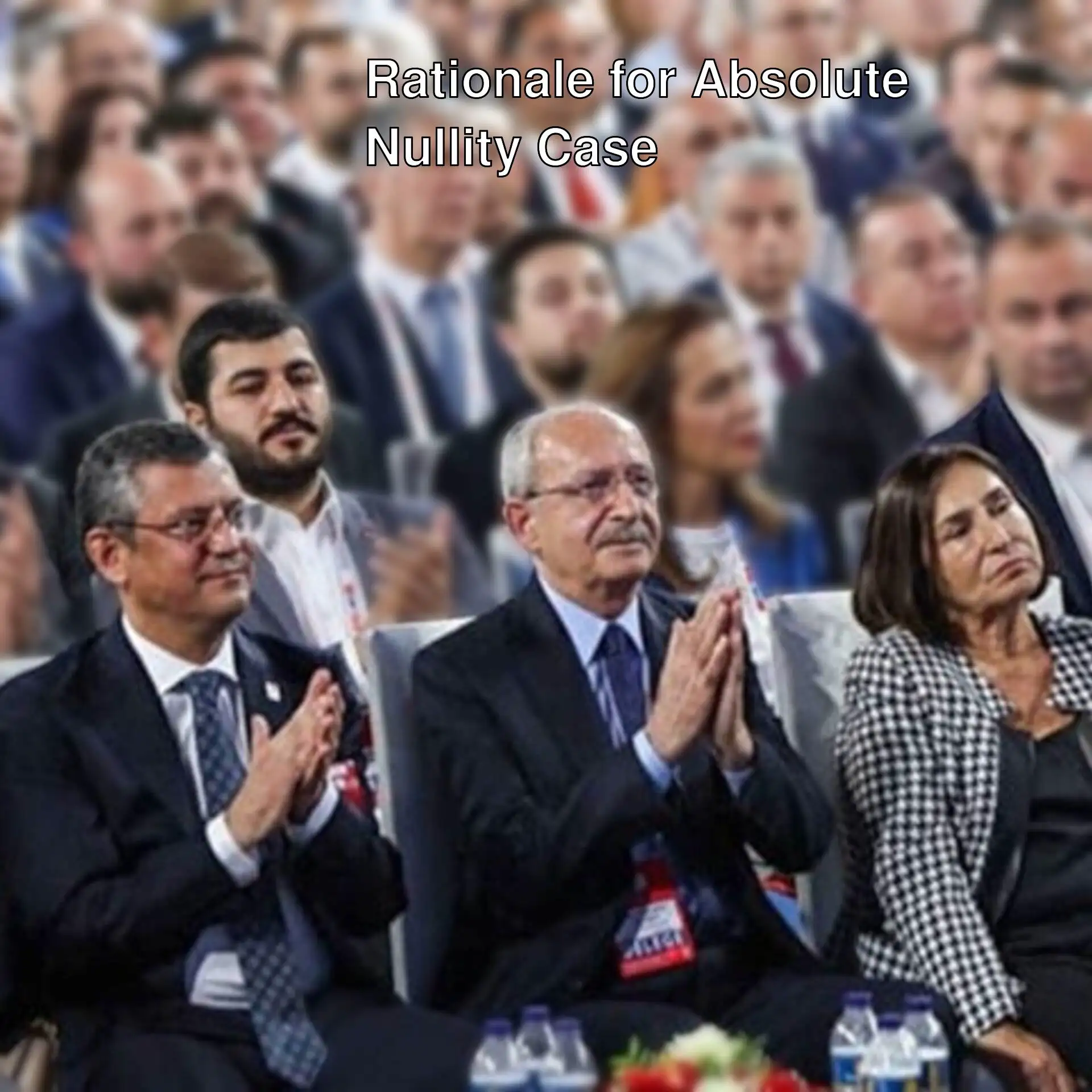 A group of people clapping.