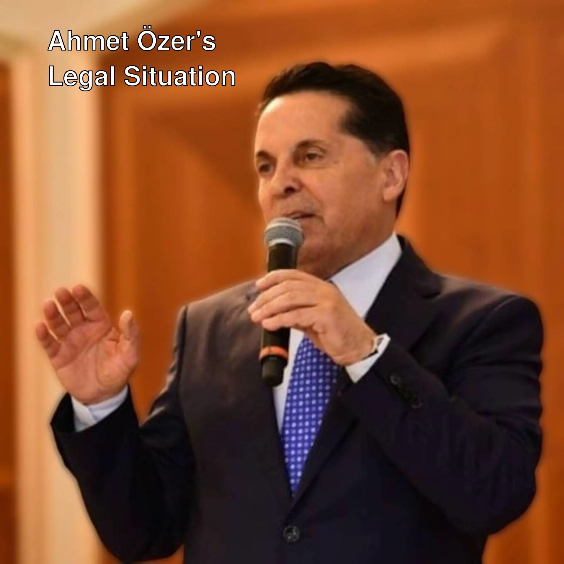 Ahmet Özer speaking at a press conference.