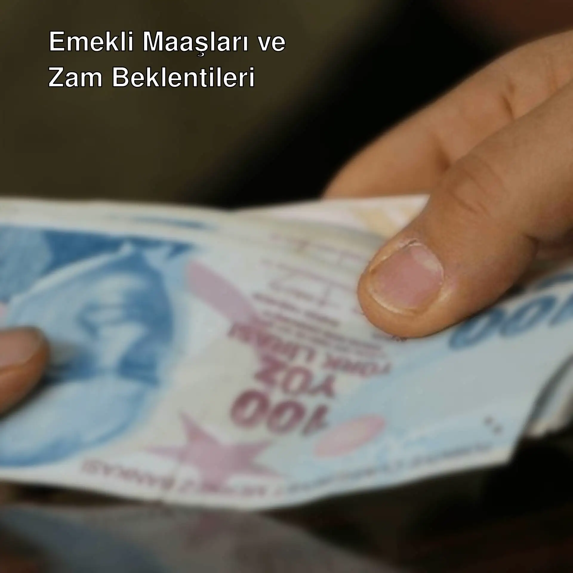 Bir kişinin para yığını tutması.