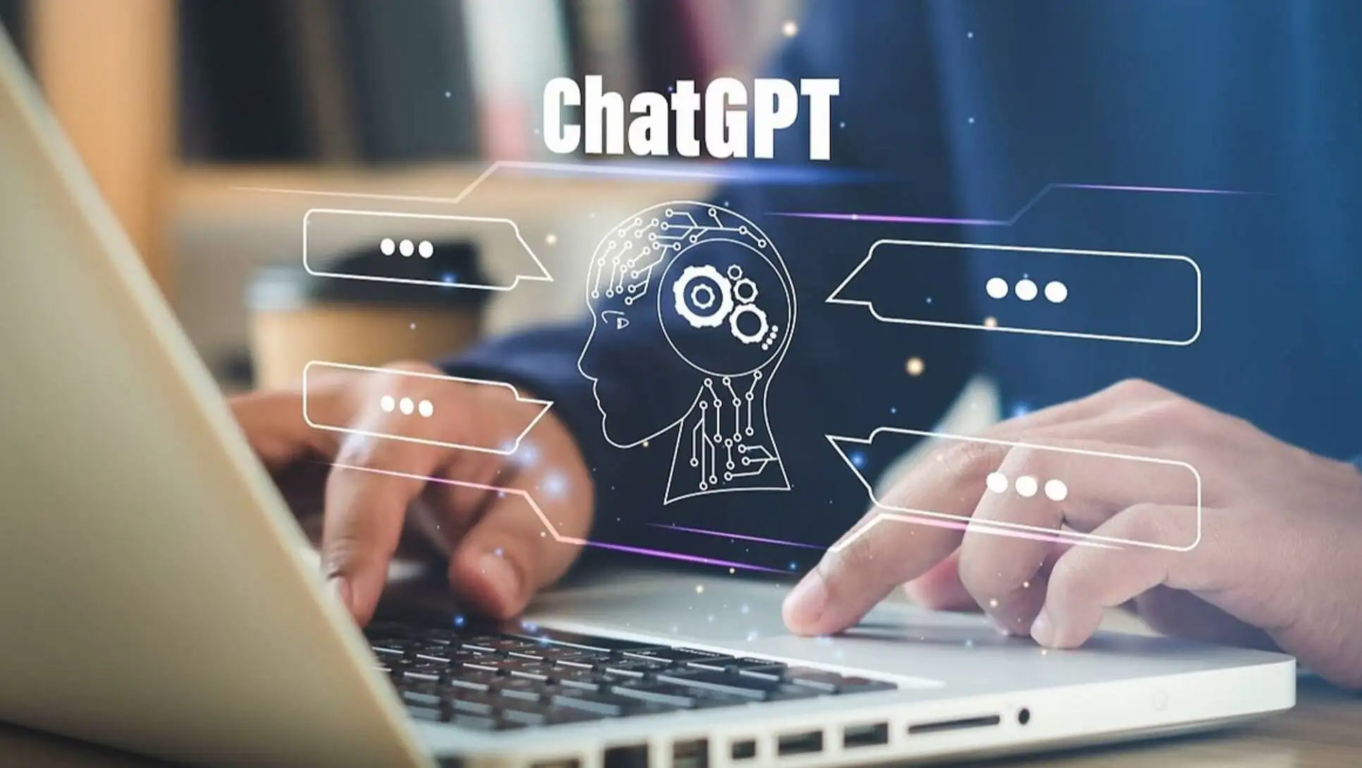 A person typing on a laptop. A person typing on a laptop.