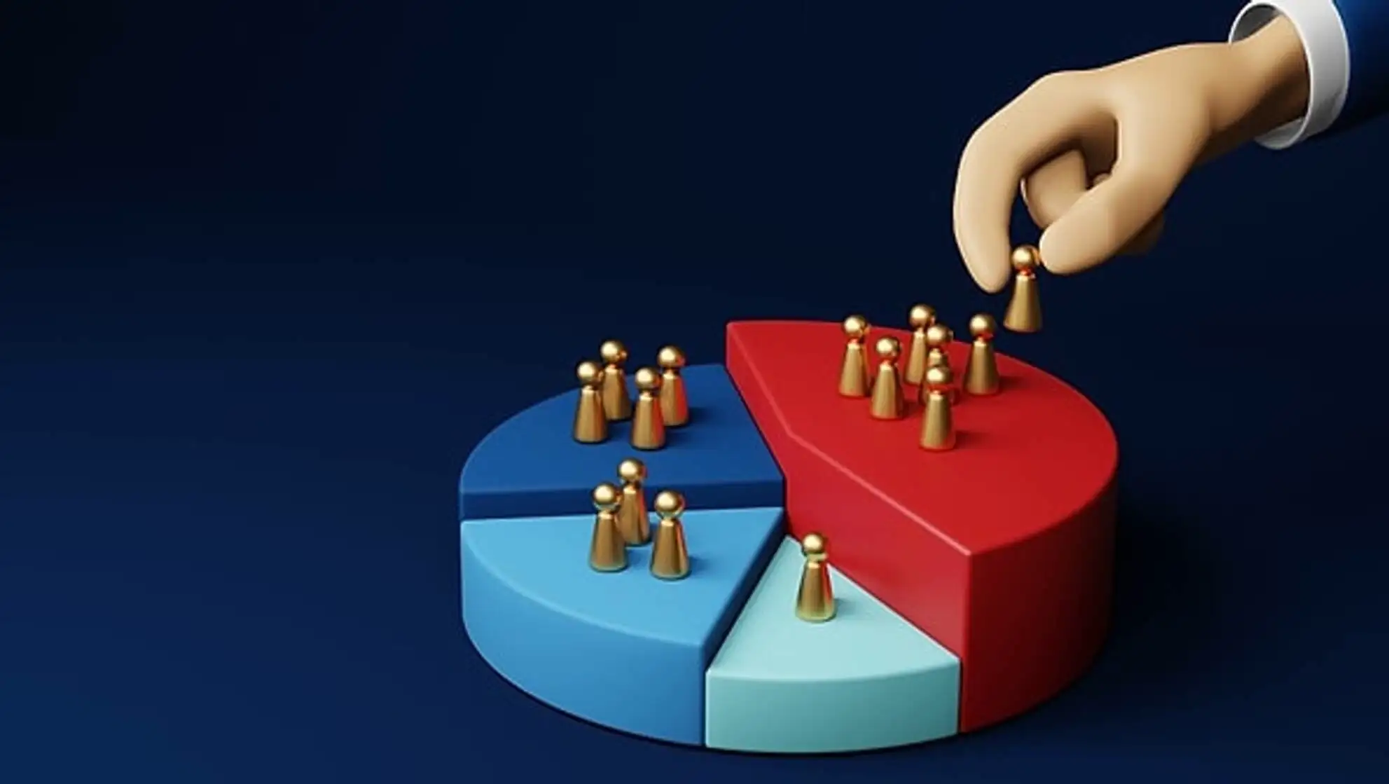 A hand placing gold figures on a pie chart.