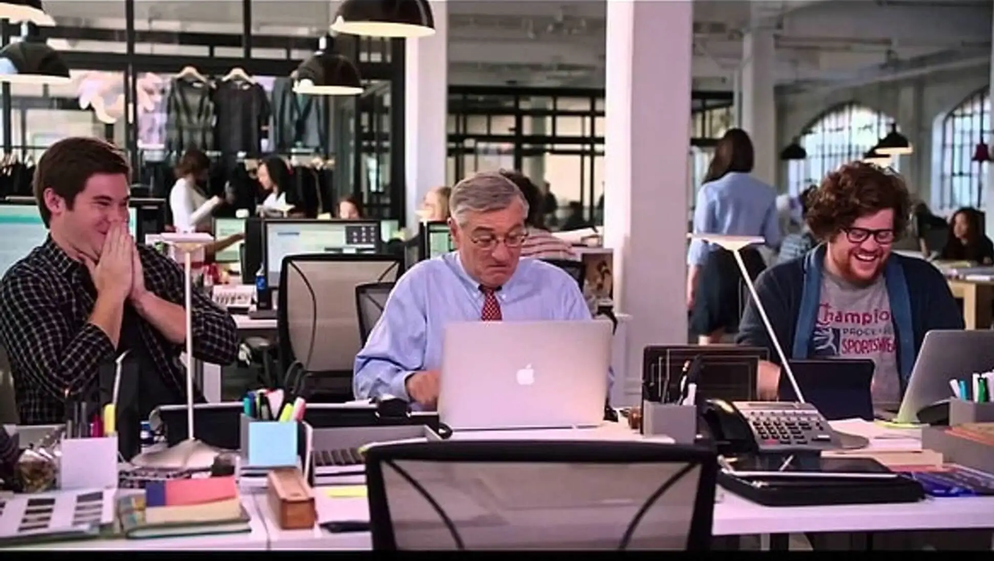 A group of people working in an office.