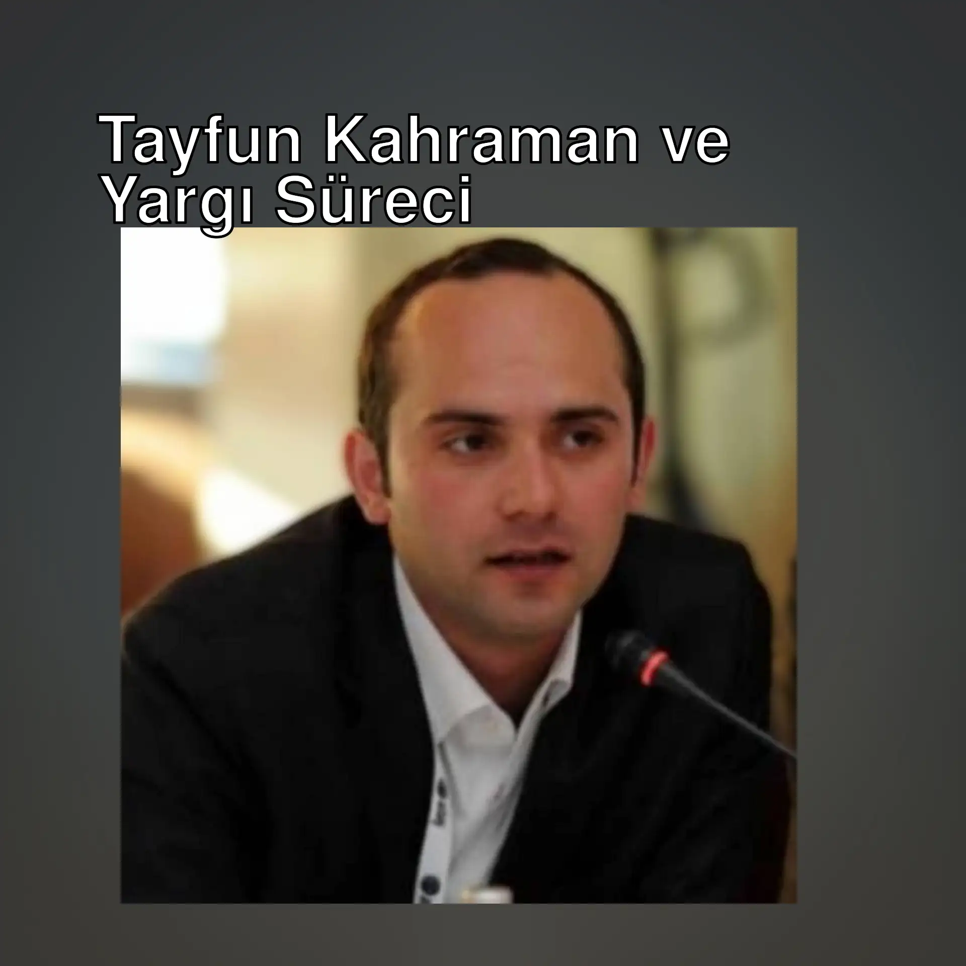 Tayfun Kahraman, mikrofonla konuşuyor. Tayfun Kahraman, mikrofonla konuşuyor.