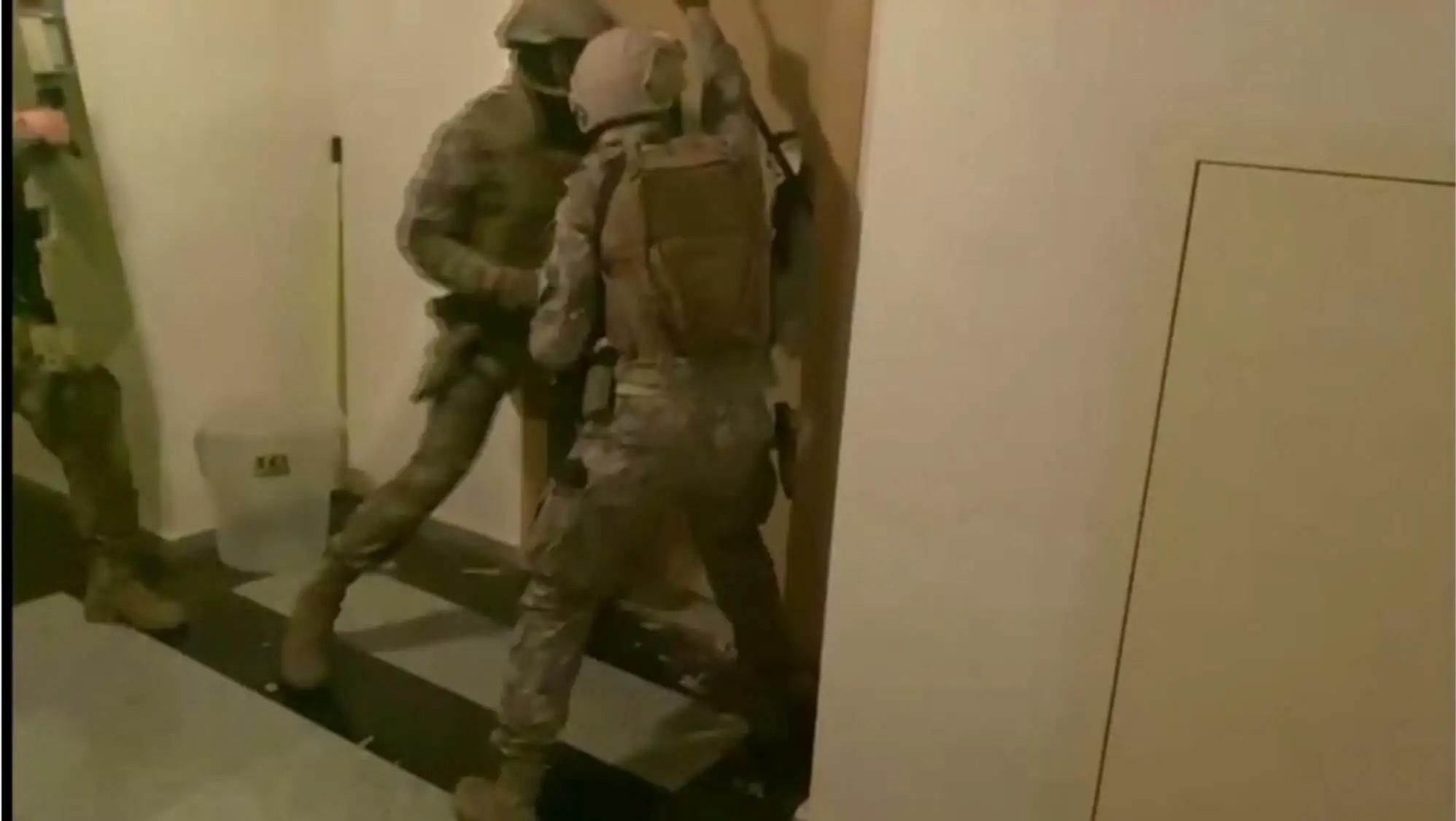 Weapons seized during the operation. A raid conducted by security forces. Weapons seized during the operation. A raid conducted by security forces.