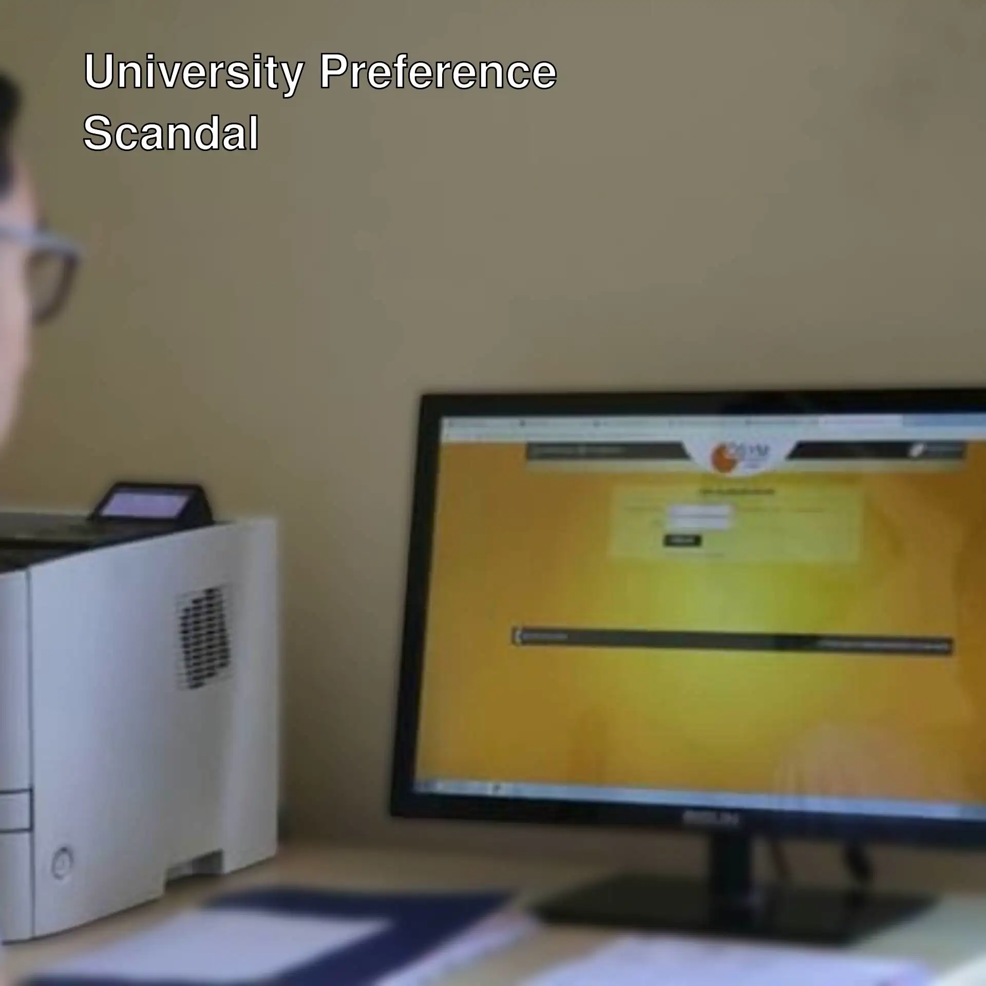 A man looking at a computer screen. A man looking at a computer screen.