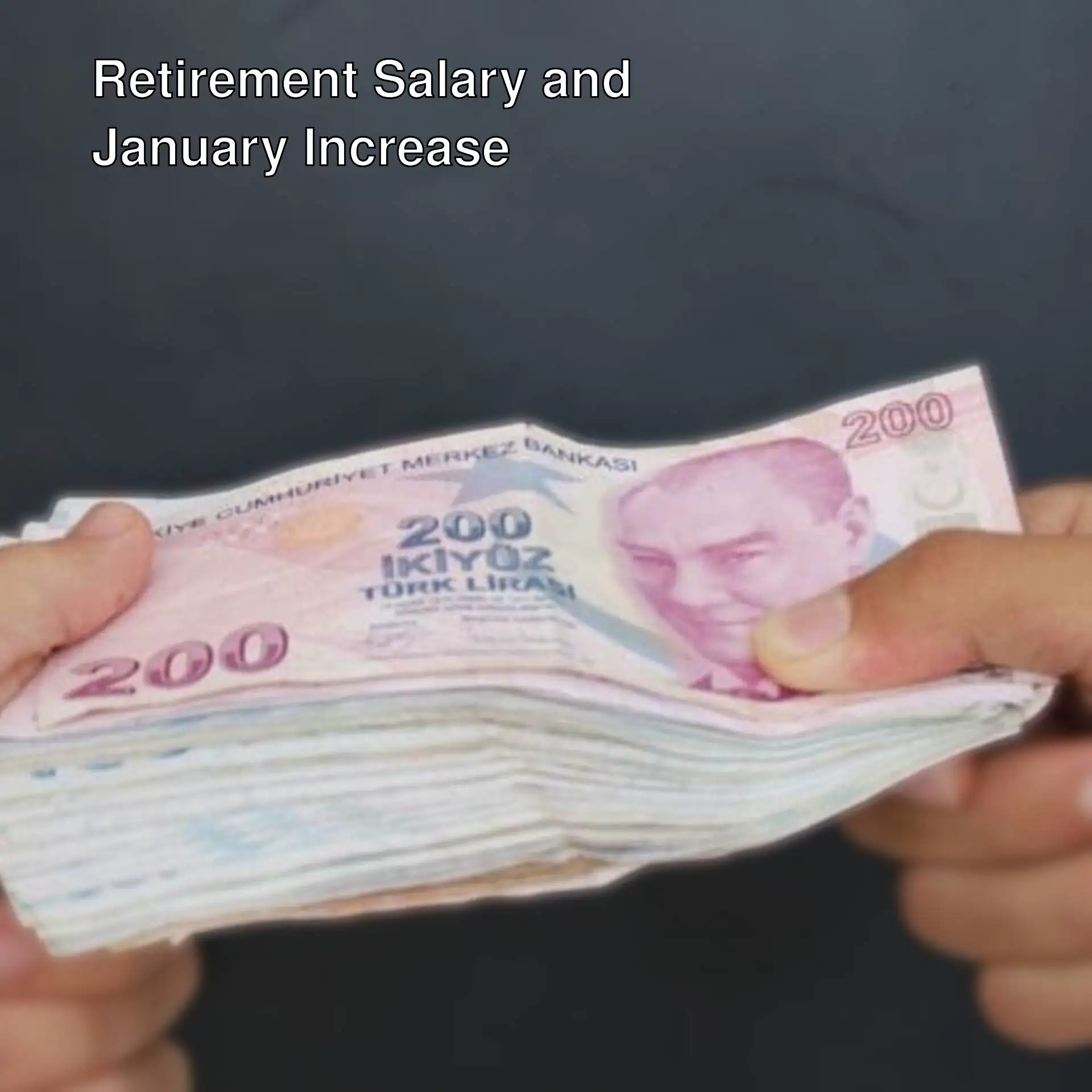 A person holding a stack of Turkish lira. A person holding a stack of Turkish lira.